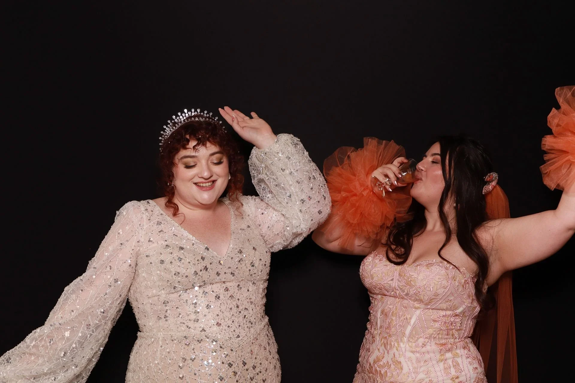 Brides-posing-photobooth-Jupiter Next-Portland.jpg