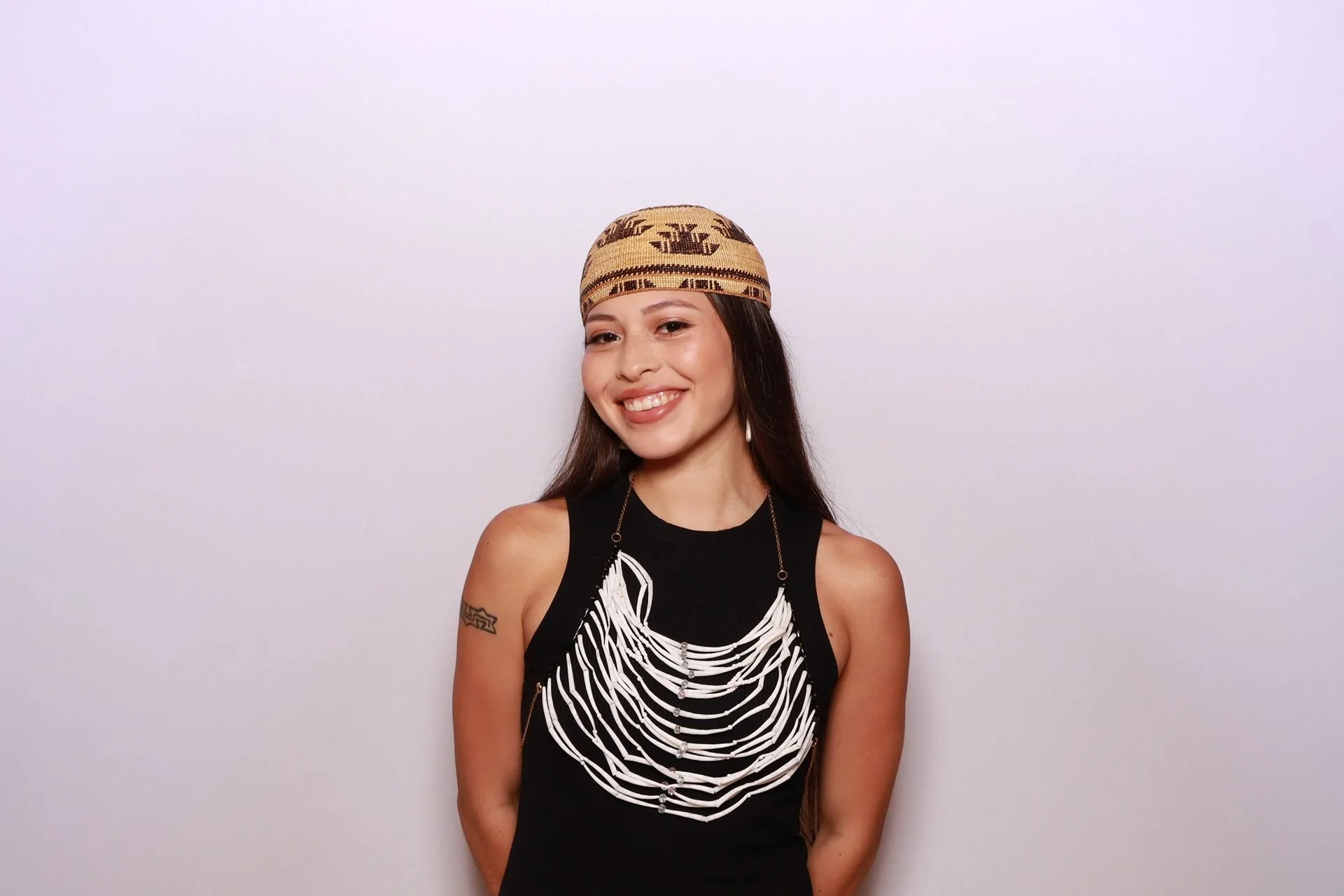Luncheon guest posing for photo booth at Portland event.