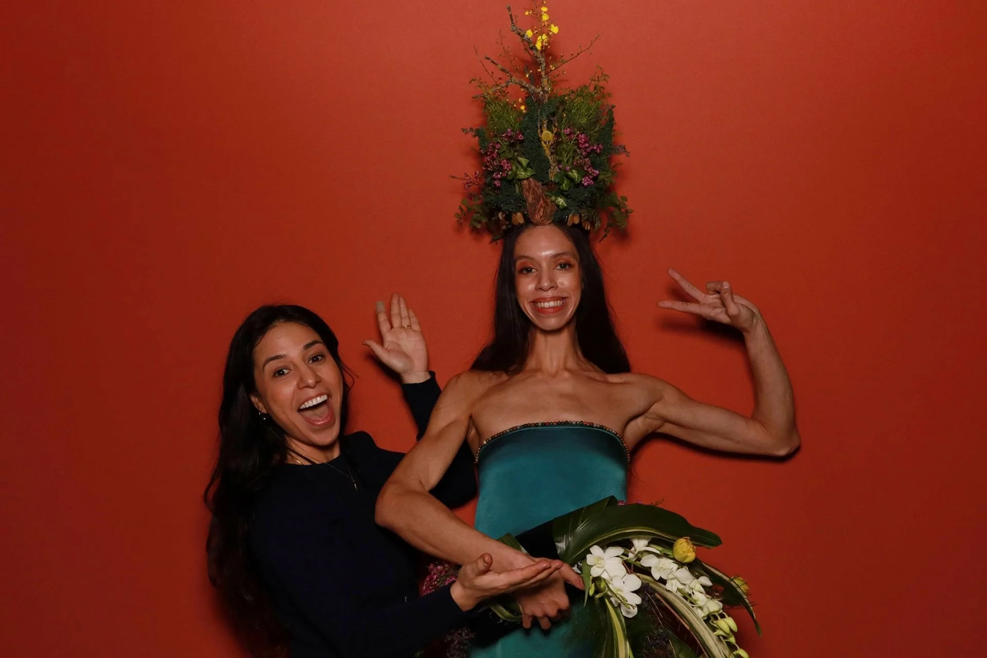 Friends posing for photo booth at a tradeshow in Portland.
