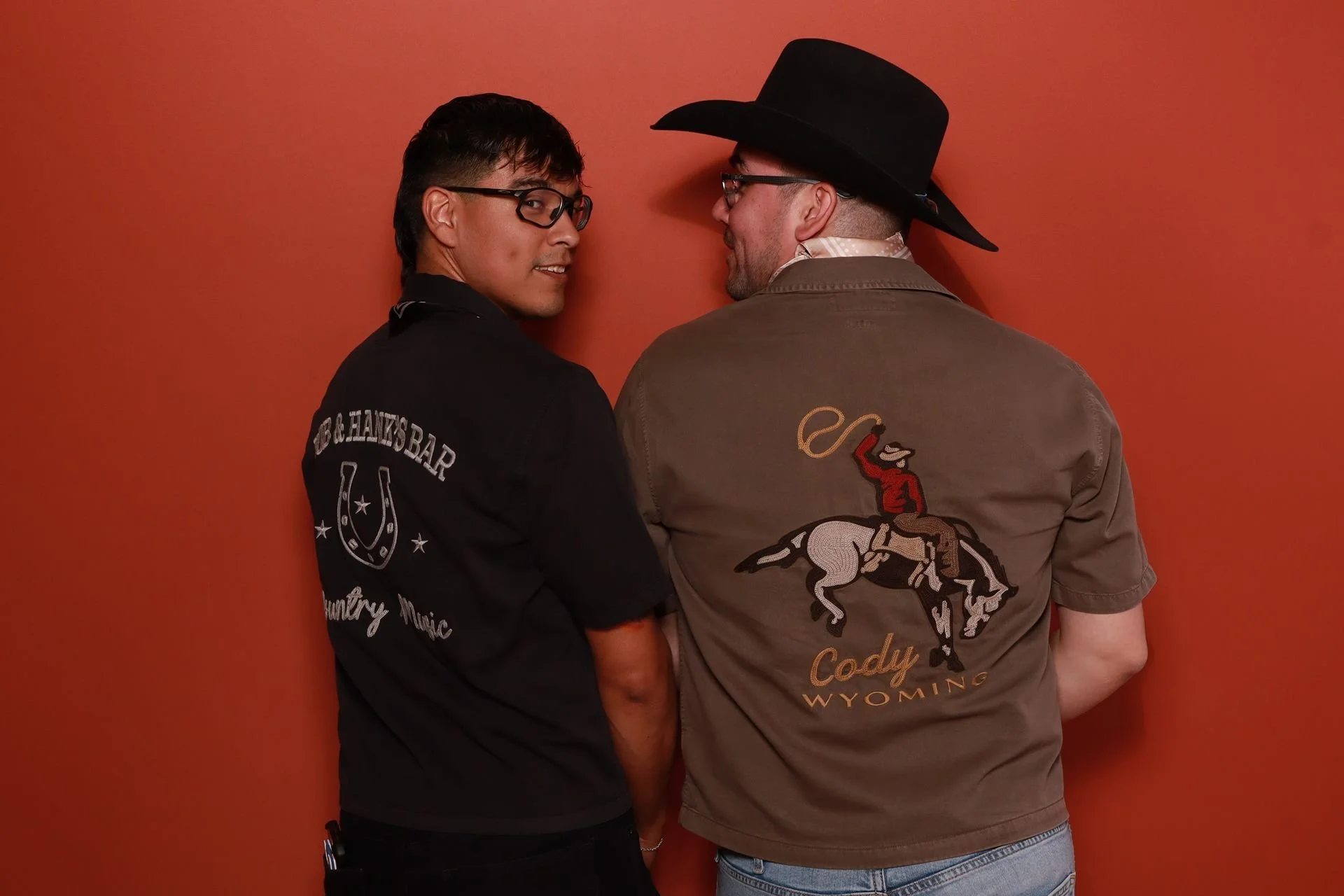 Two wedding guests posing in photobooth at Evergreen Events McMinnville.