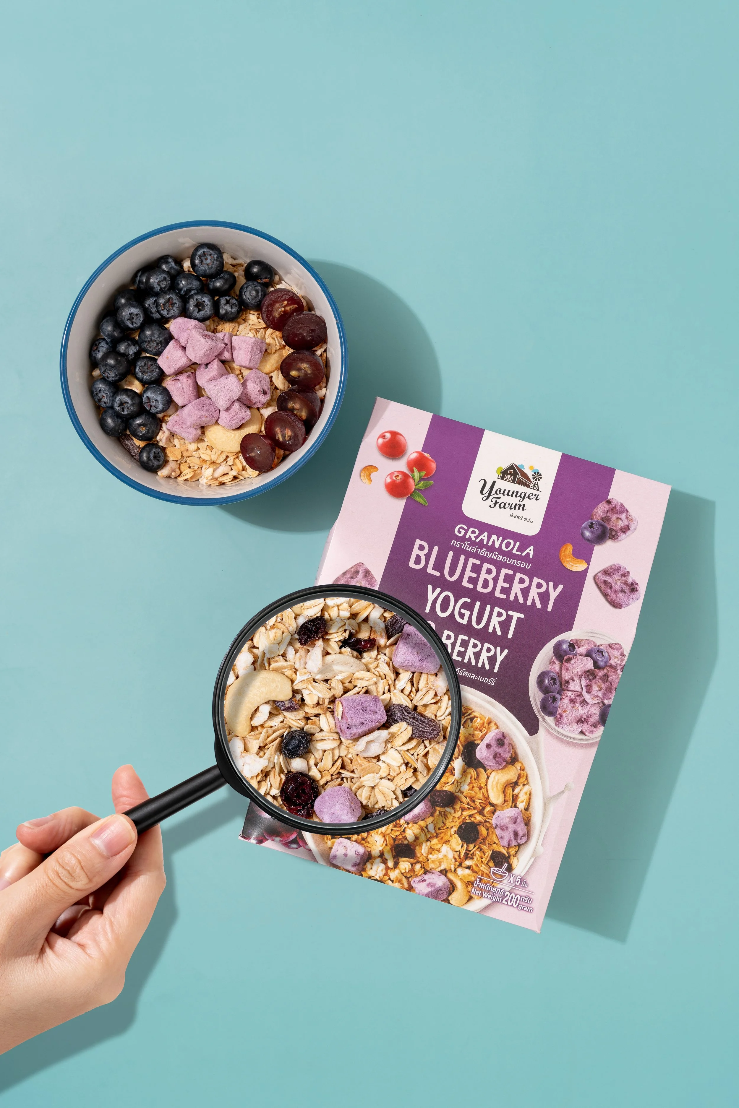 Bowl of Younger Farm granola with blueberries and blueberry yoghurt – imported breakfast foods supplied by Jetha Australian food importers