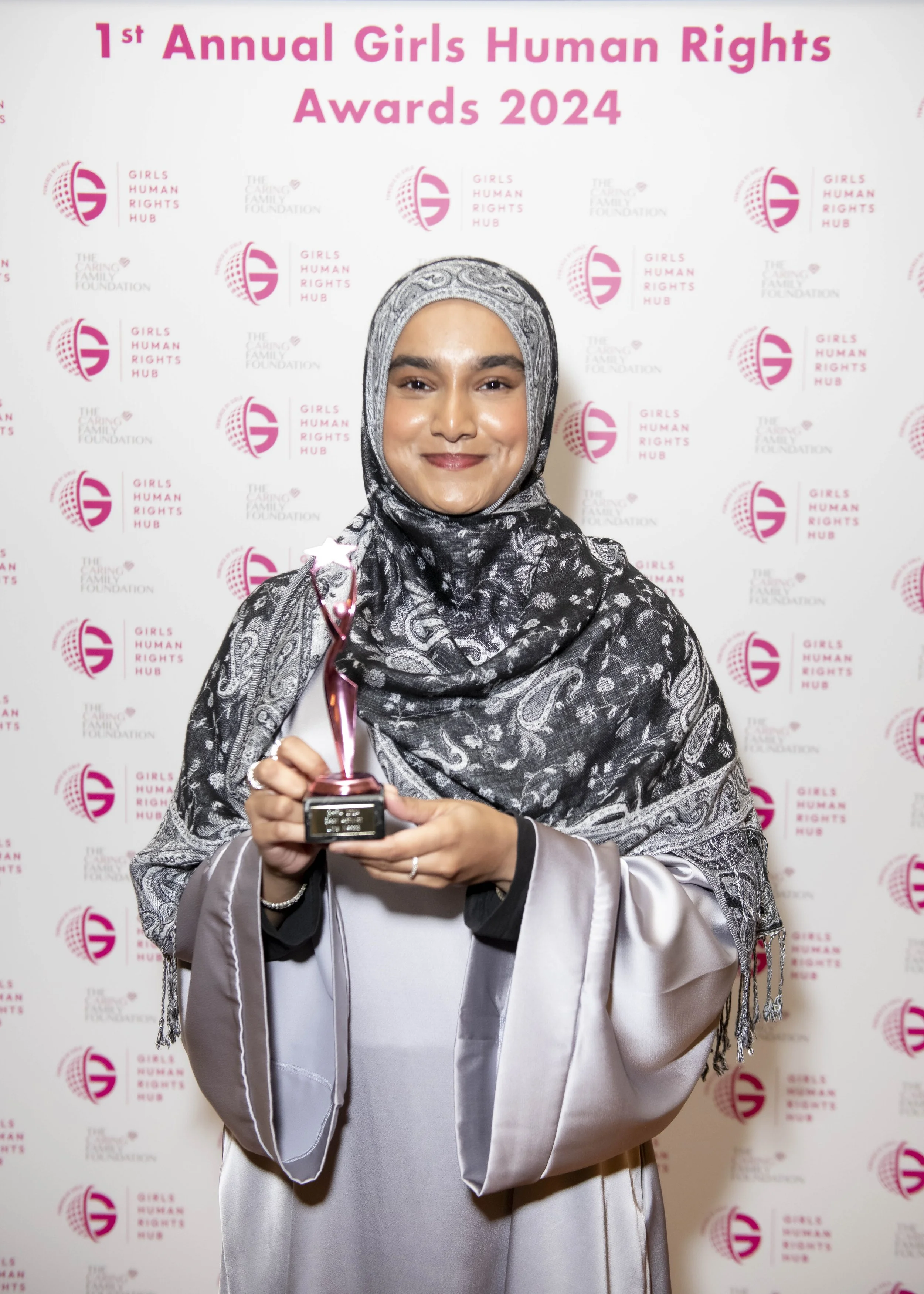 Lipa Nessa with her award at the 1st Annual Girls Human Rights Awards 2024