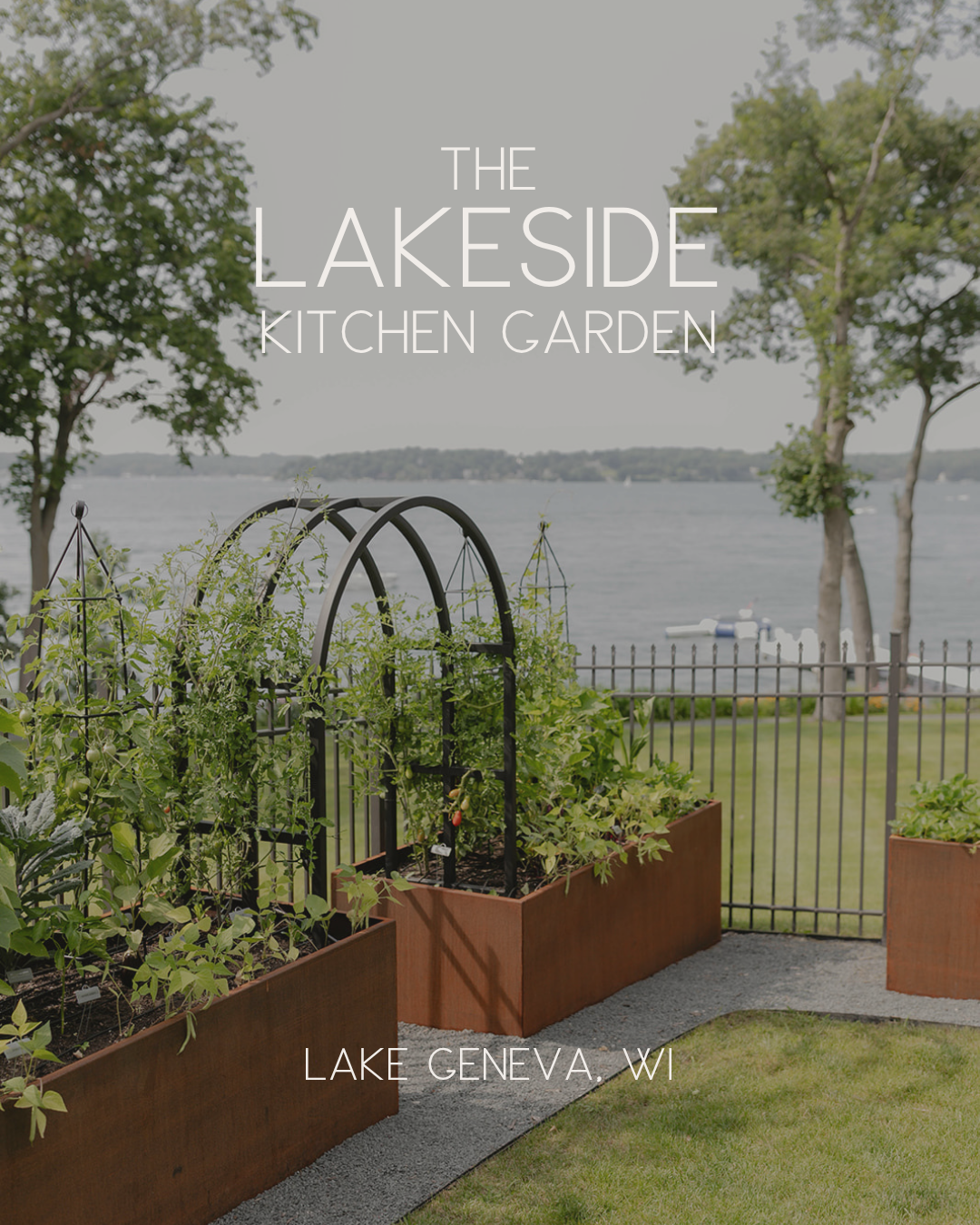 The Lakeside Kitchen Garden with custom corten steel raised beds, black garden trellises, and a lakefront view.