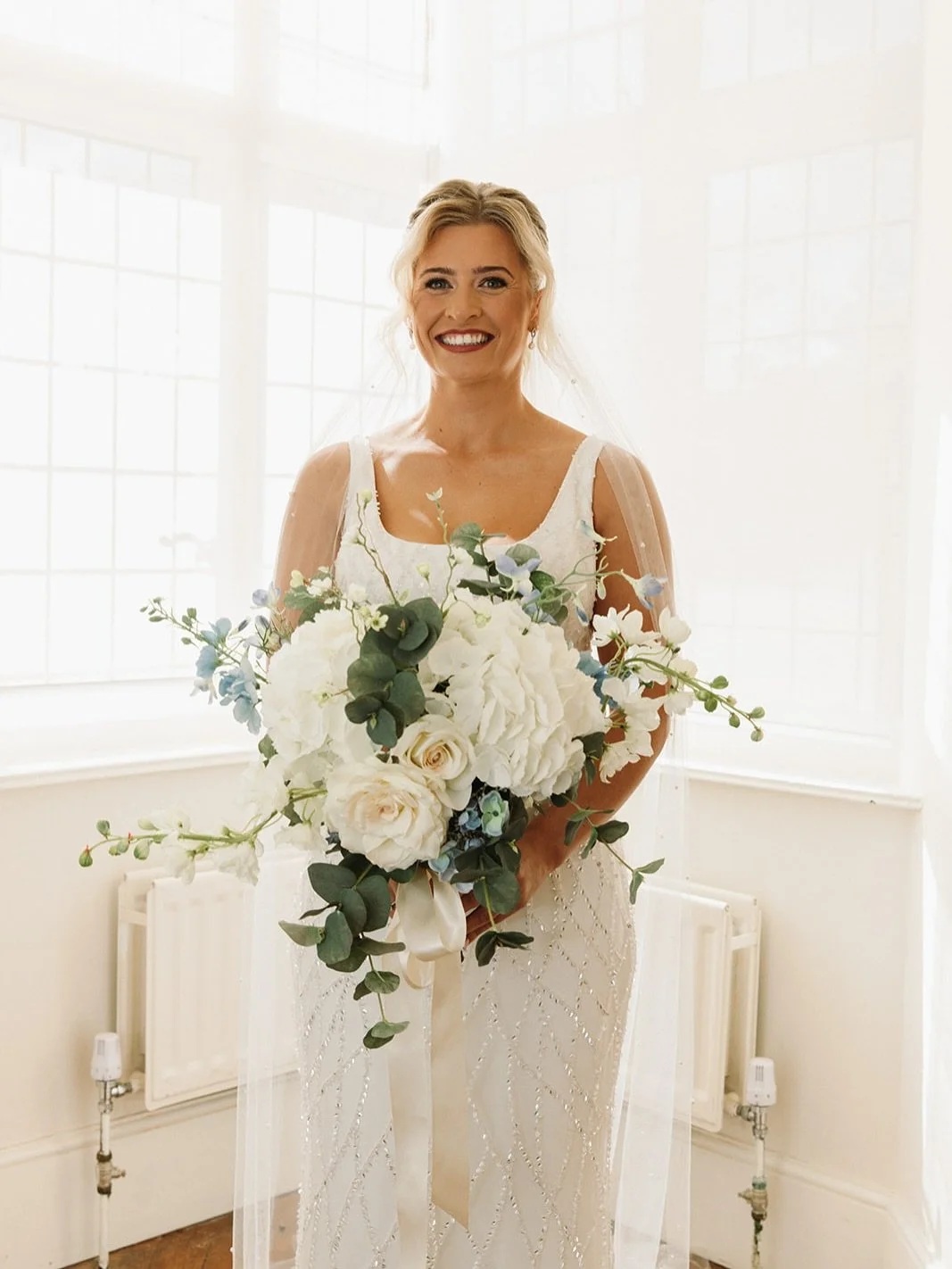 Brides, if you&rsquo;re dreaming of a bouquet that&rsquo;s romantic, timeless and made just for you 🤍 &mdash; silk florals might be the answer.
For Lucy, we created this whimsical, non-symmetrical design with soft hydrangeas, ivory &amp; blush roses