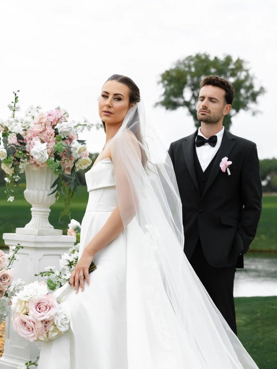 Katy &amp; Joe&rsquo;s dreamy &ldquo;I do&rdquo; moment 🤍 Creating depth, romance, and a little bit of magic with urns, pedestals, and lush floral moments. Our silk florals stay picture perfect all day long and can be seamlessly repurposed from your