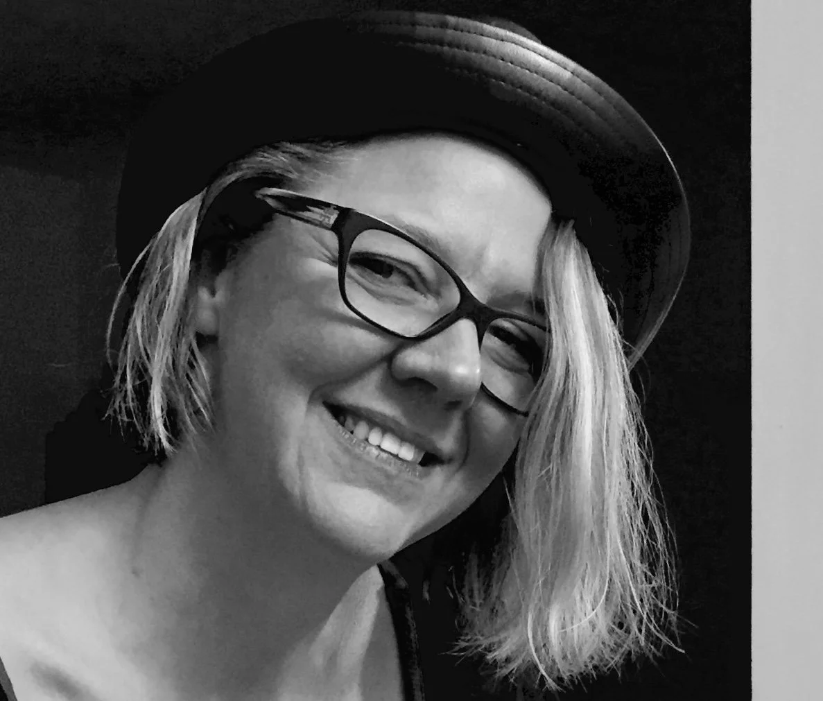 Rebecca Schoenewolf, LMHC, LPC (She/Her)