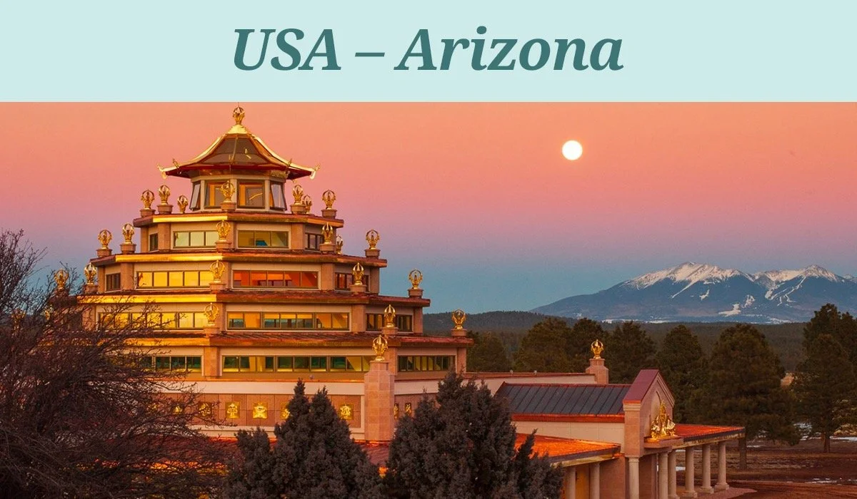 Kadampa World Peace Temple in Arizona at sunset with mountains
