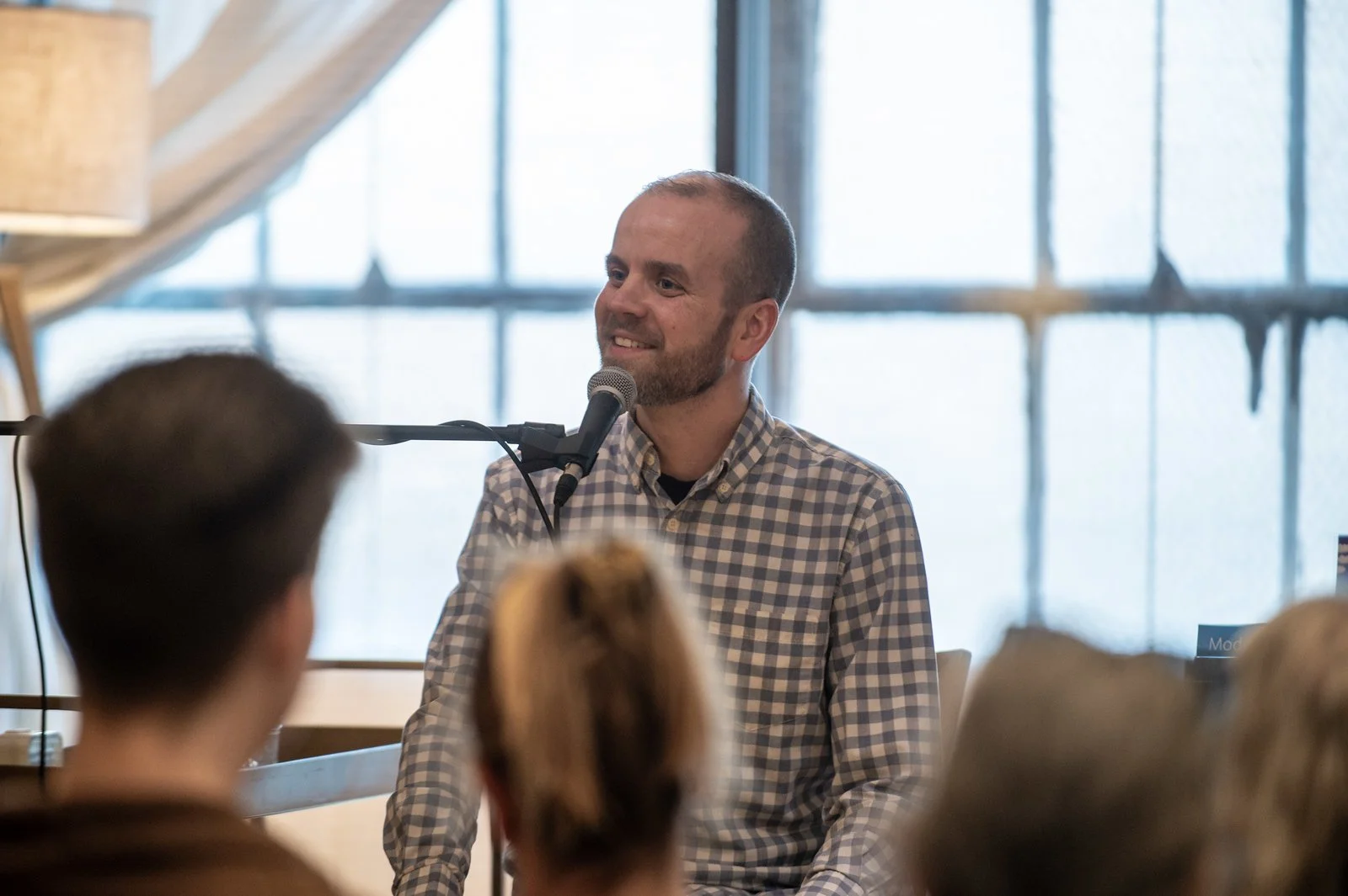 Meditation Teacher Kadam Kyle Davis teaching to an audience