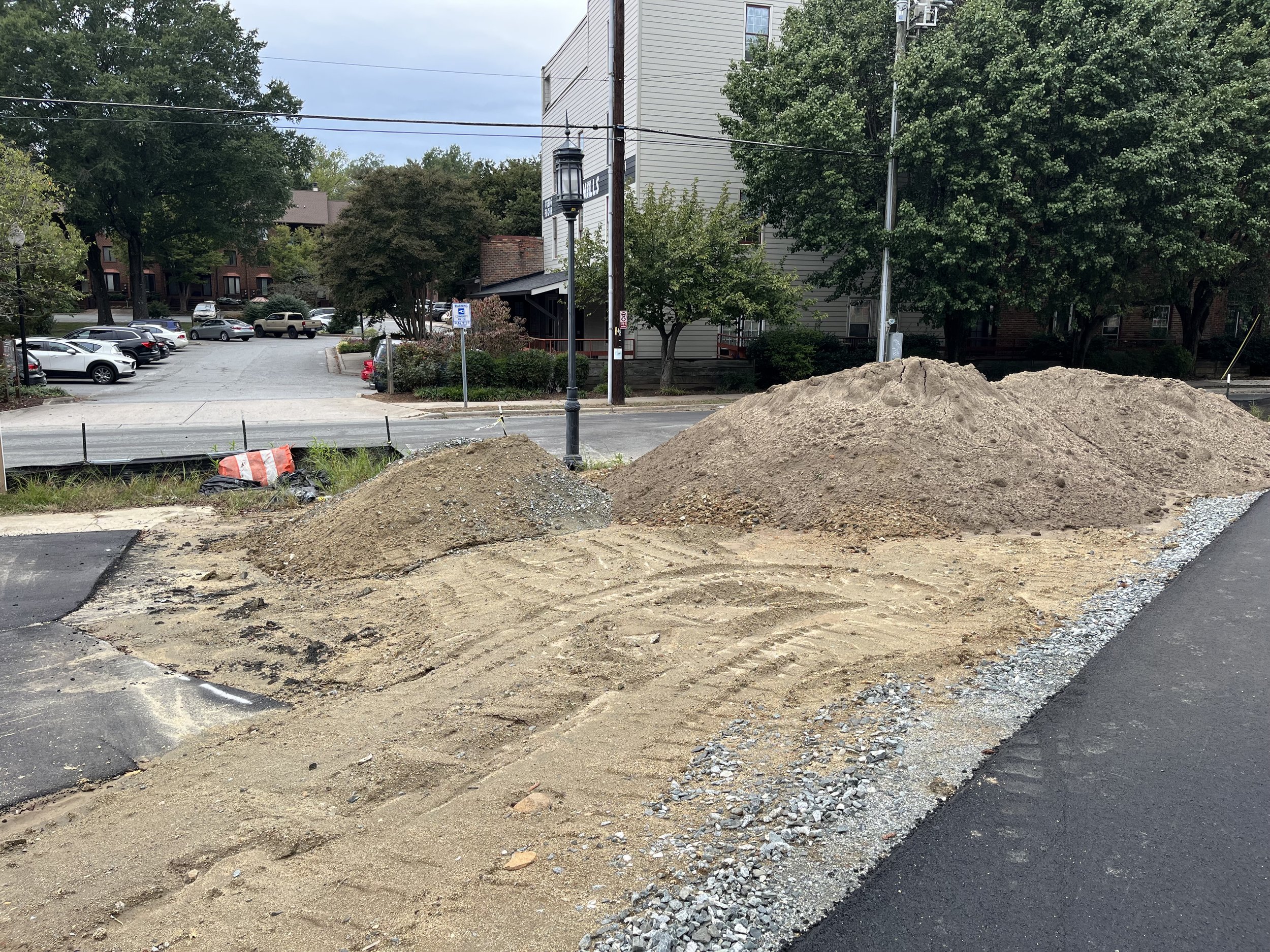  The last section of the Greenway behind Wafco Mills, between McGee Street and Spring Garden Street,  has now been paved with asphalt!! 