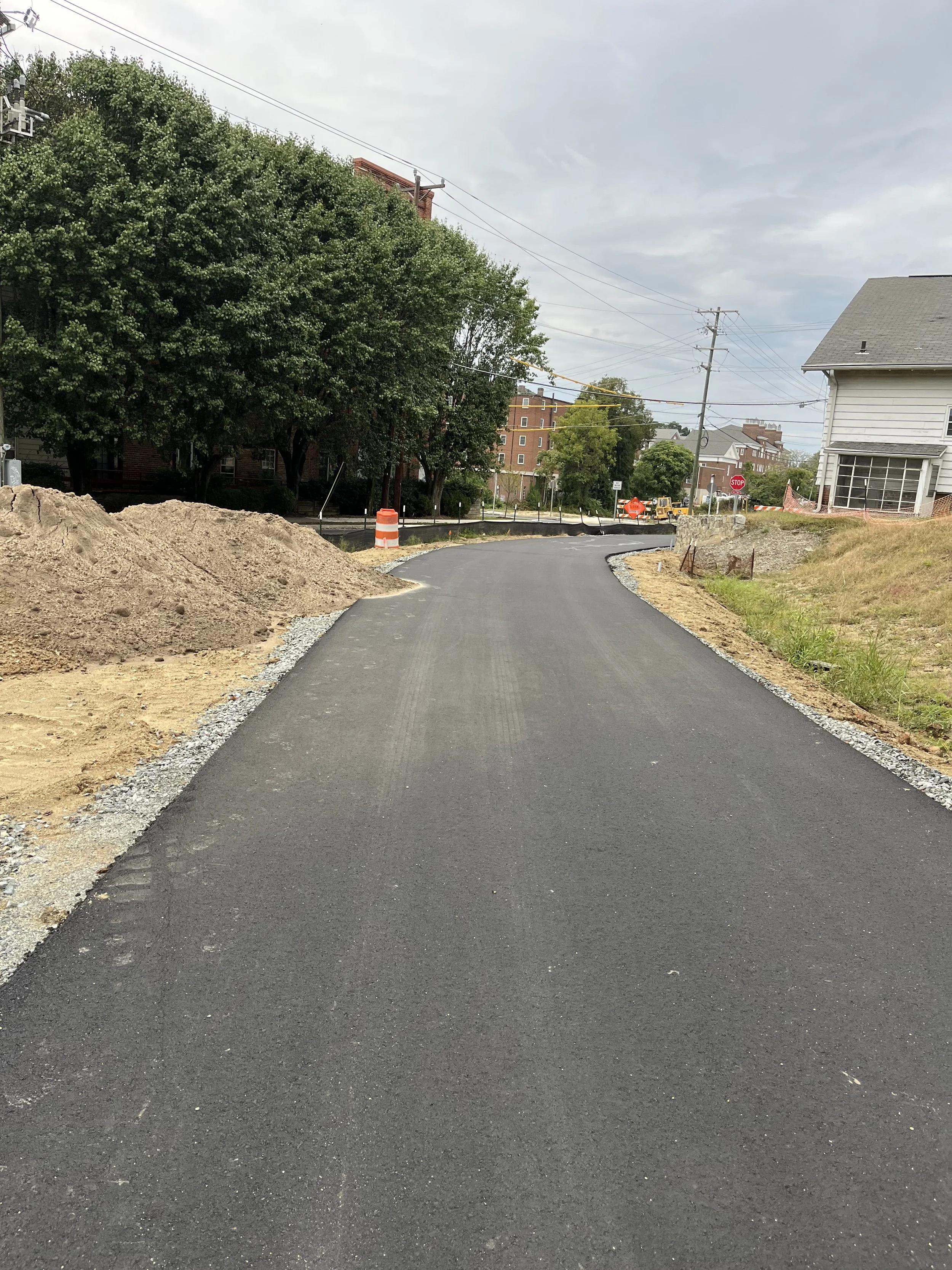  The last section of the Greenway behind Wafco Mills, between McGee Street and Spring Garden Street,  has now been paved with asphalt!! 