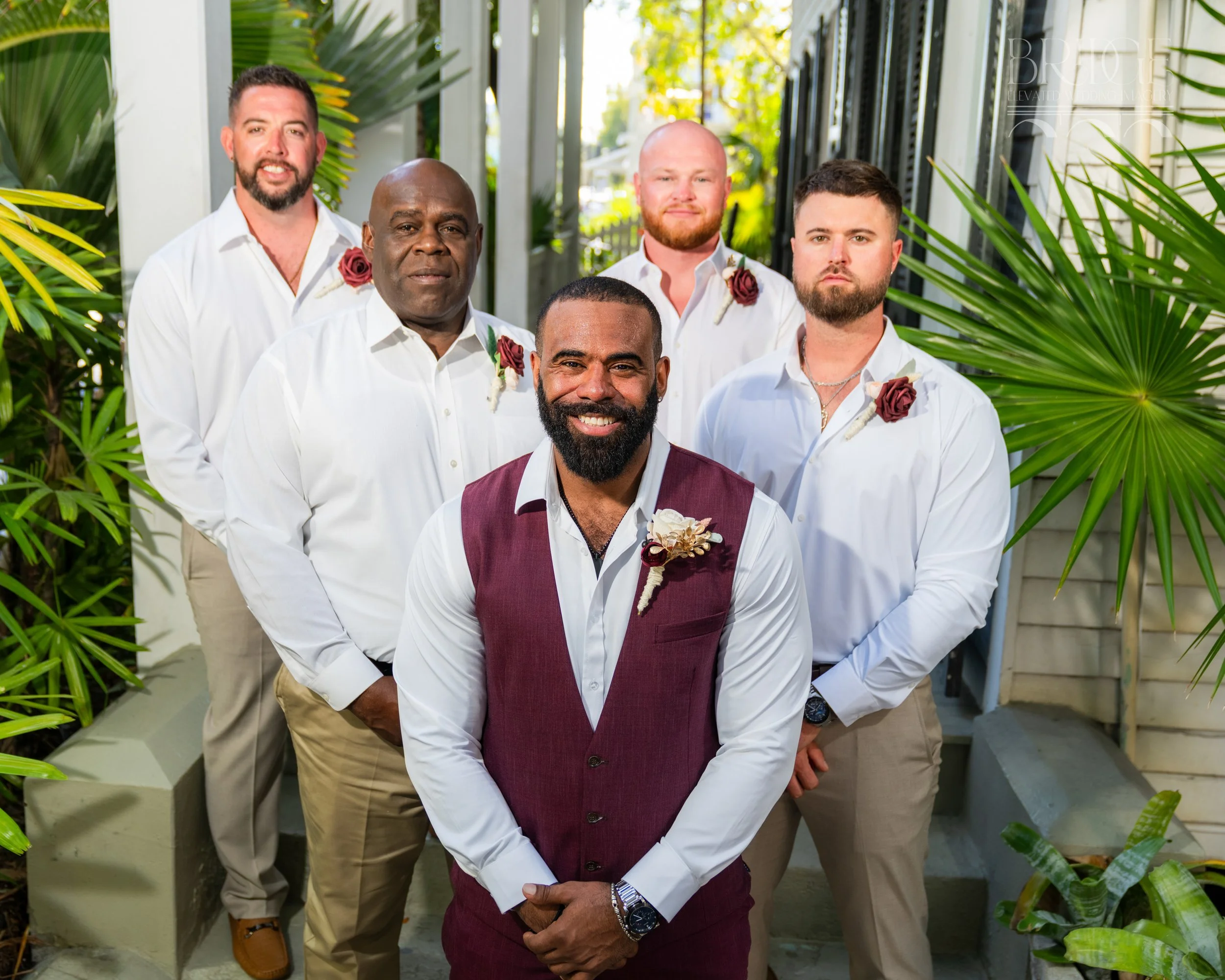 Athas-Johnson_260228-PREVIEW-043_18433-BridgeImagery-9 hours, 2026, brick courtyard, Danielle and Will, destination, family, February, garden, groomsmen, group, Key West, mixed-race couple, Old Town Manor, small, tent reception, tropical.jpg