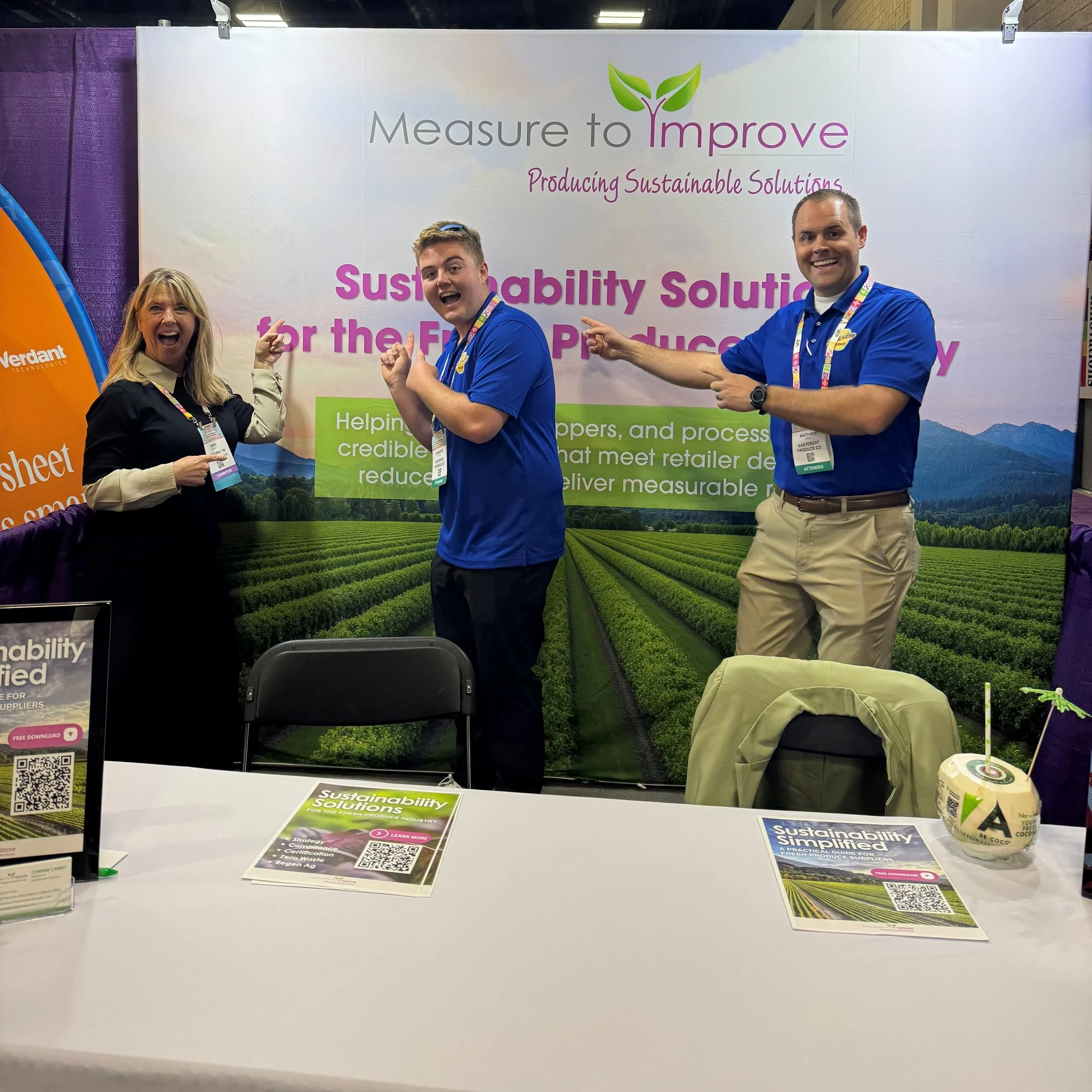 Cameron and Matthew from Easterday Farms visiting Measure to Improves booth.jpg