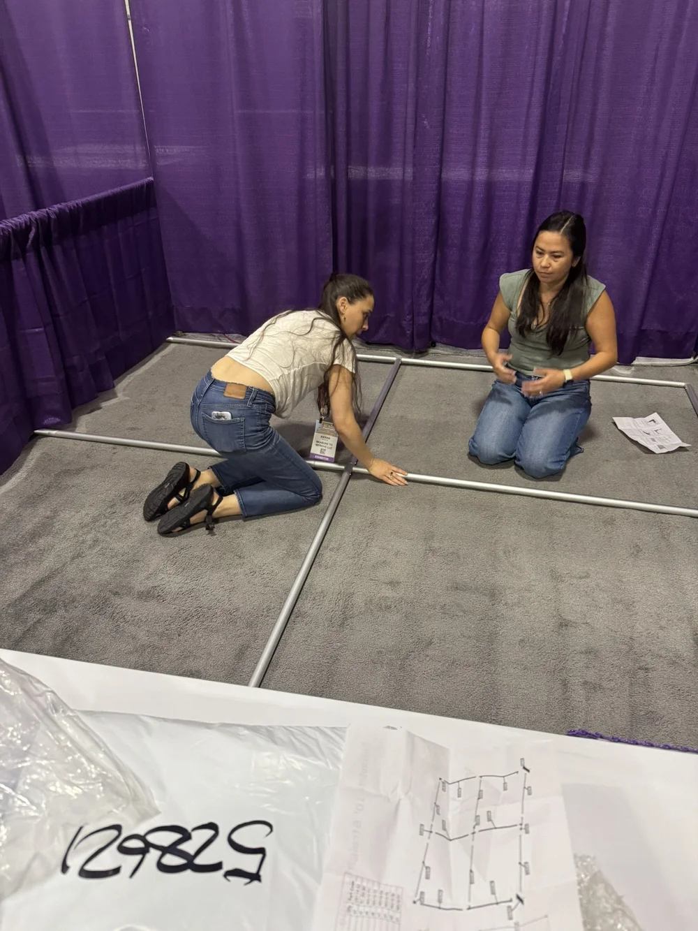 Team Work Setting Up the Booth.JPEG