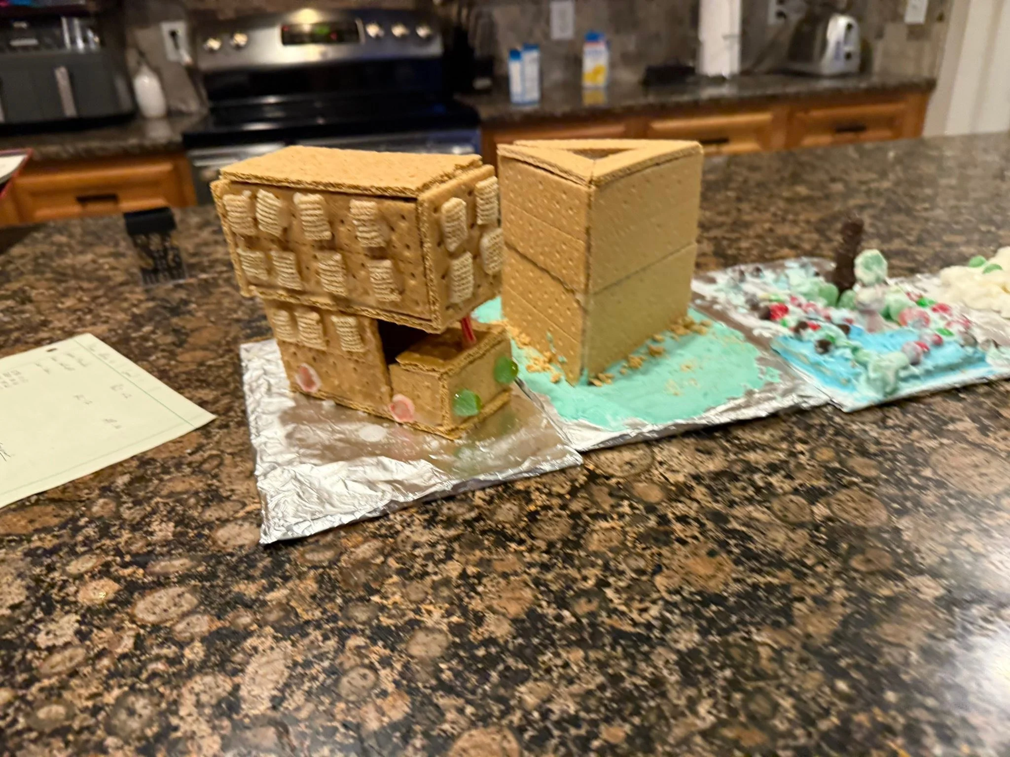 First annual graham cracker competition is done. 

I failed with the glue icing but we managed. Our theme was Hogwarts. 

Robert&rsquo;s not picture cause he ate his already&hellip;.