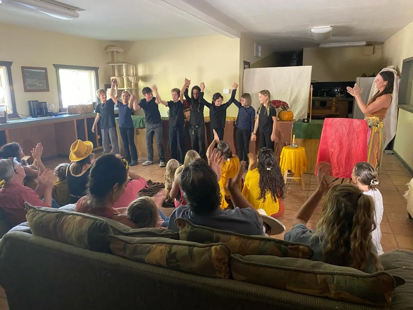 Michaelmas Harvest festival of courage. Every year we tell the story of the dragon and sing the songs that remind us to be true and brave, press apples, dye with marigolds and eat dragon bread all together and give thanks for the harvest.