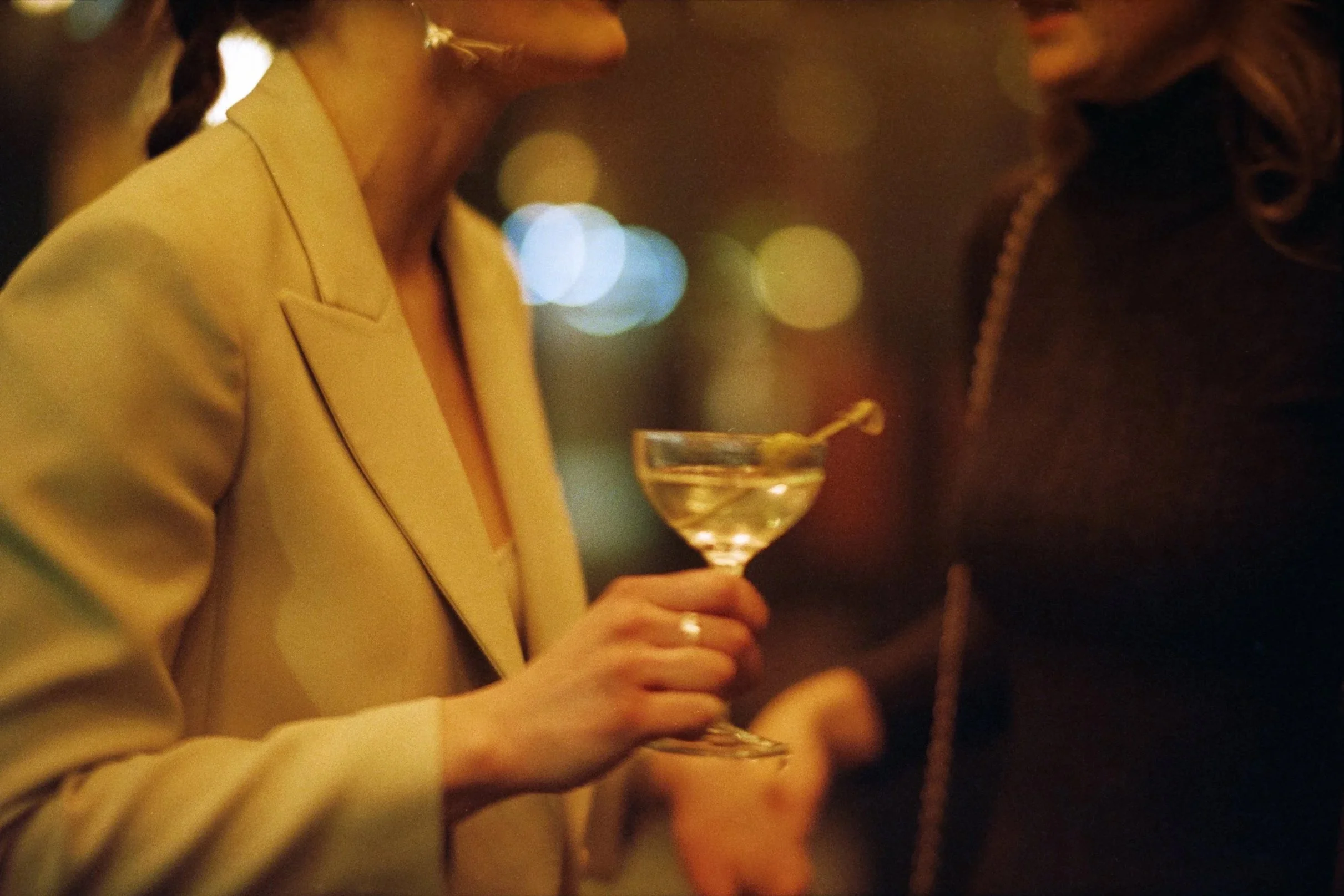 bride at ace hotel welcome party with martini Brooklyn NYC