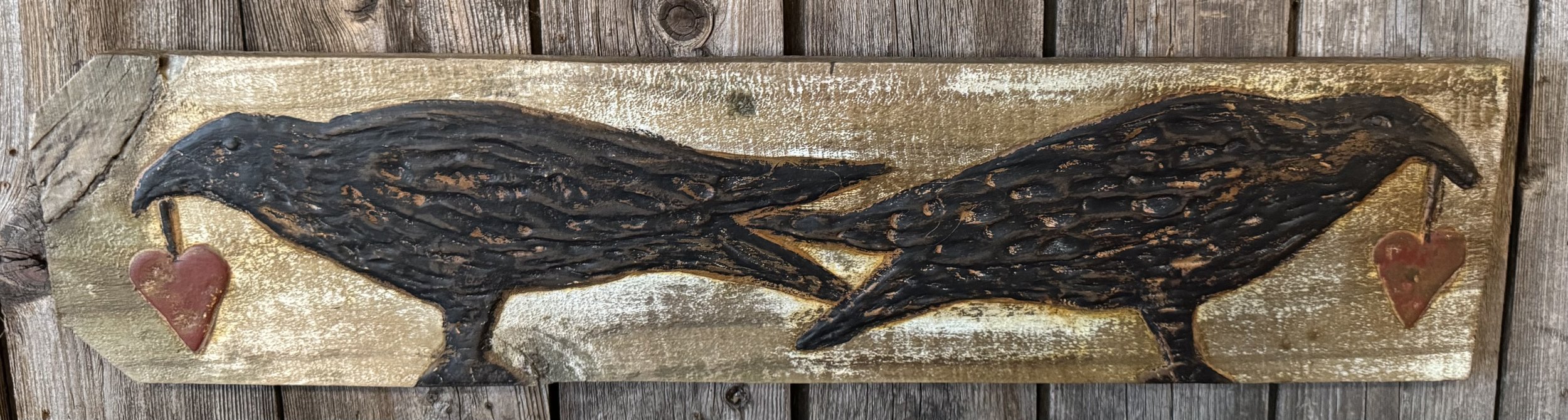 Two Crows with Hanging Hearts