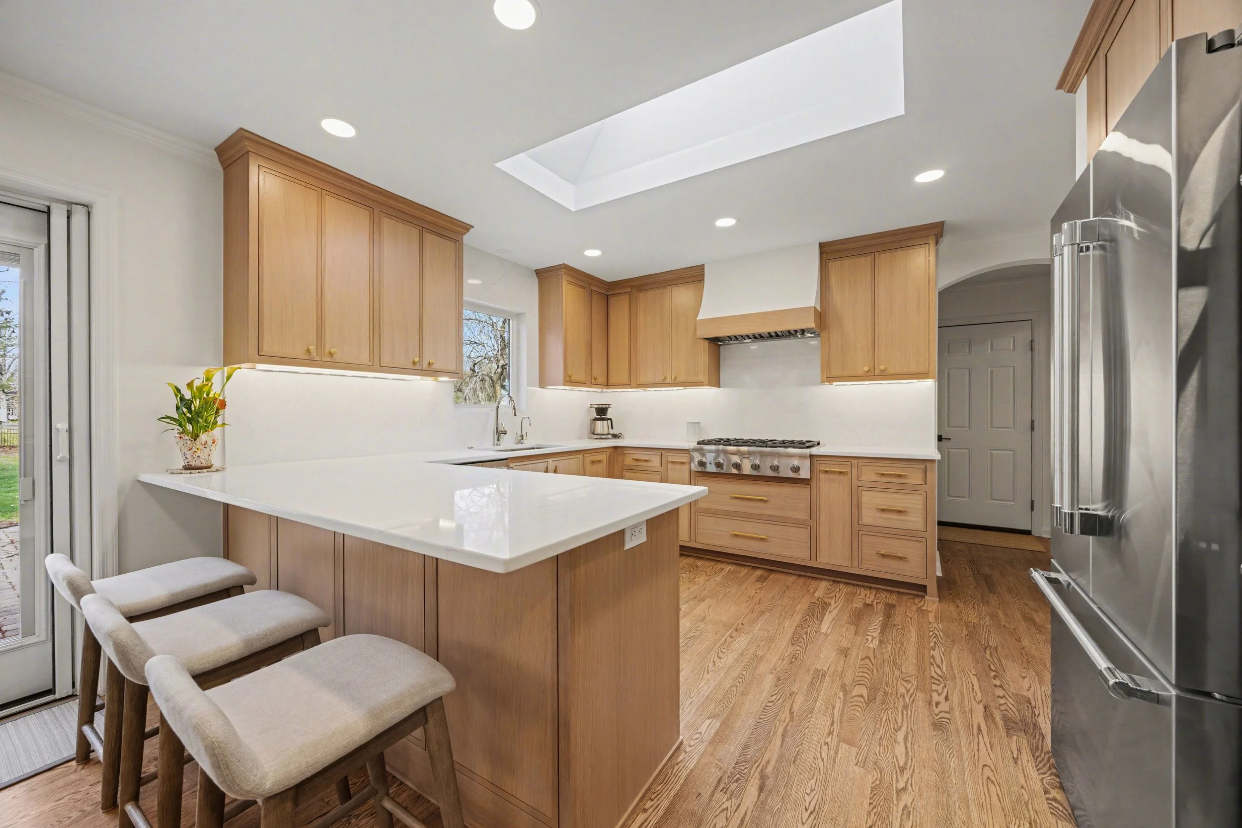 Full wall quartz with miter cuts around window