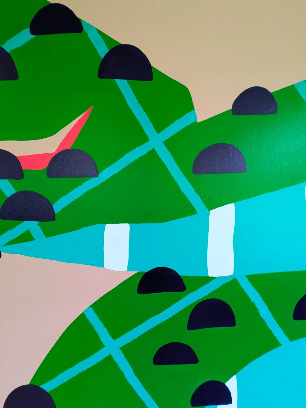 Sumatran Pit Viper mural in the Jungle Grill Building at the Racine Zoo, showing a colorful jungle snake and leaves with dots and stripes cropped close to show detail.