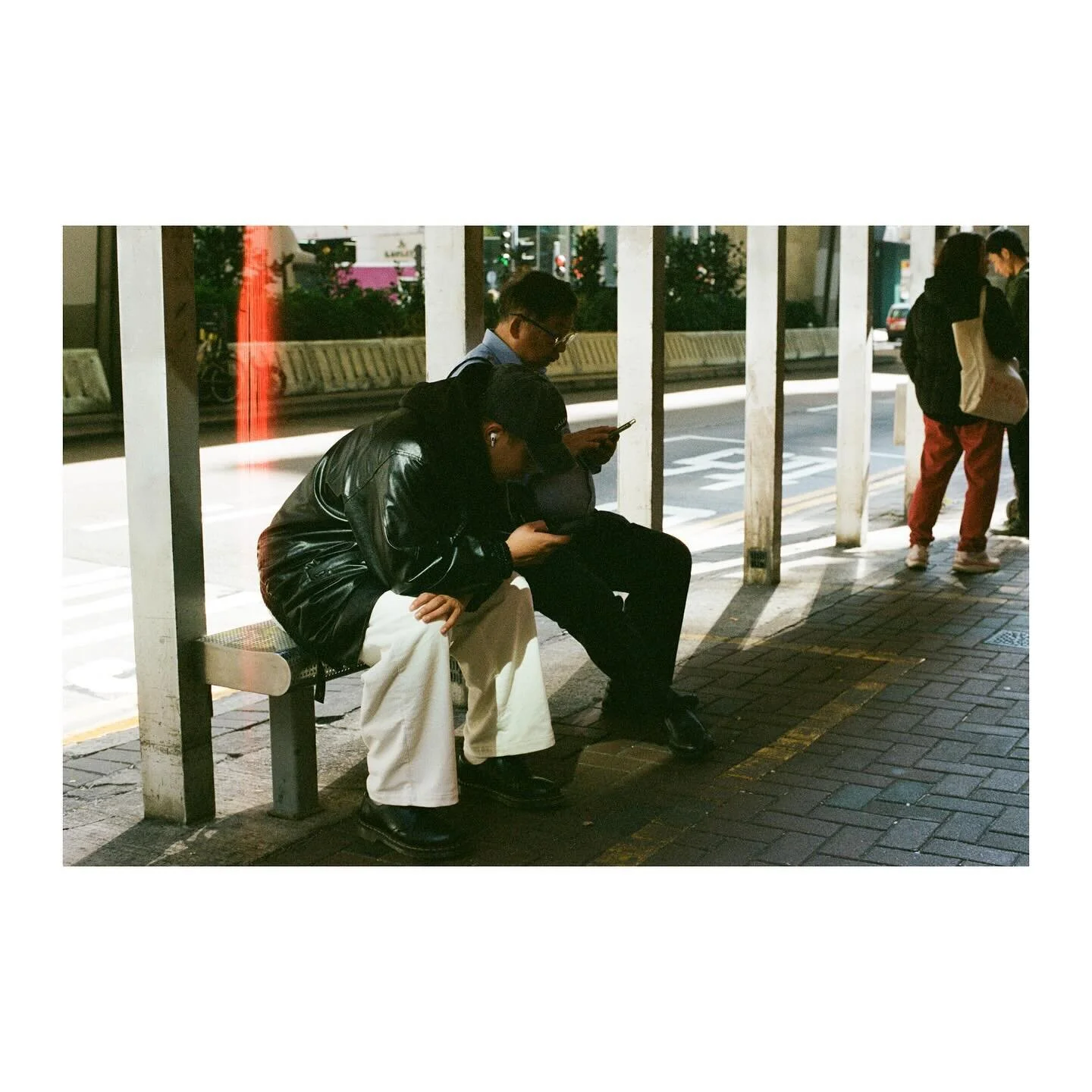 Focusing on the phone

Leica R8
Leitz Summilux-R 50mm f/1.4 V1
Kodak Portra 400
D&amp;S @hk_camera