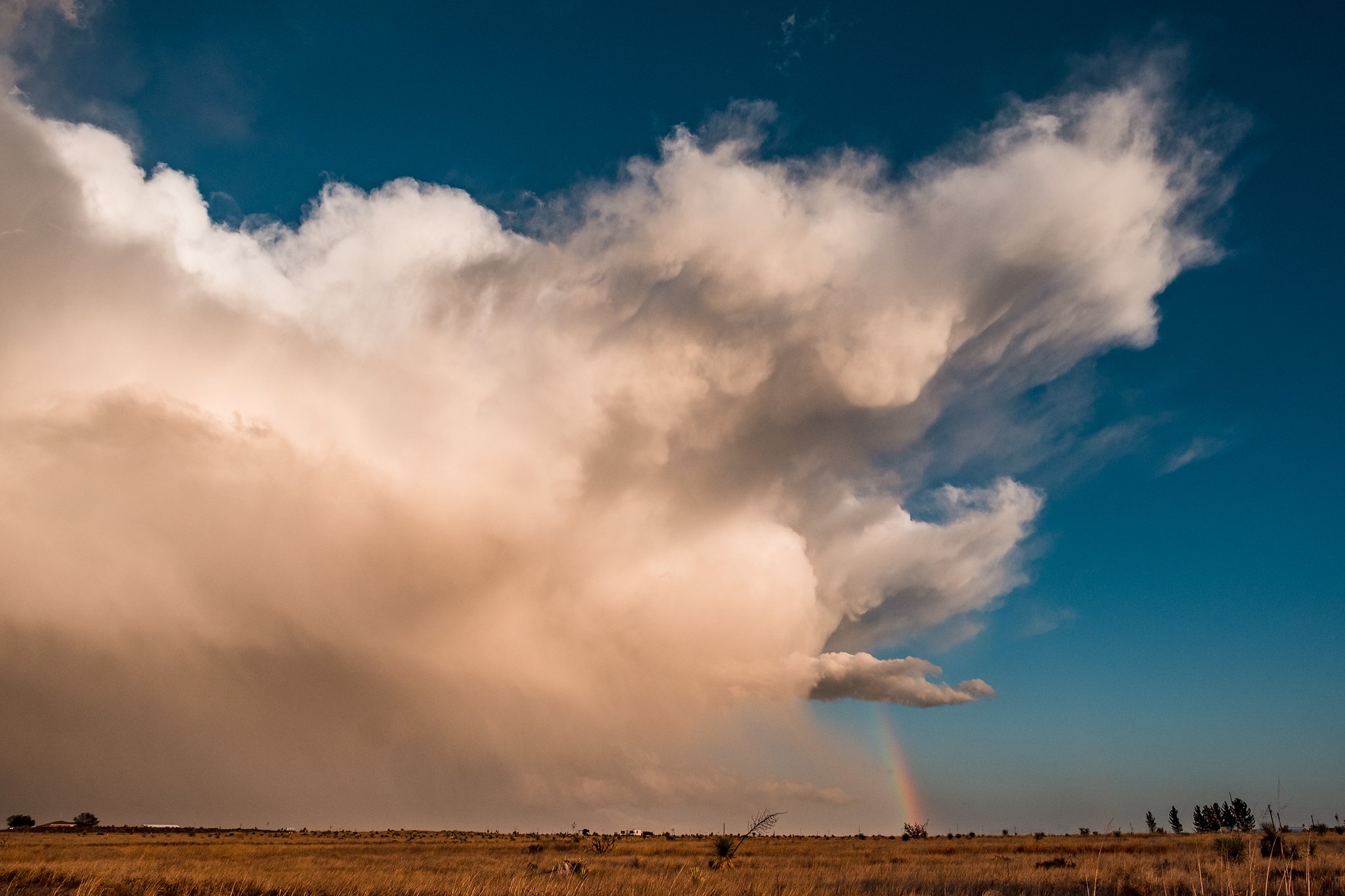 I took this photo in May 2019. I was actually trying to get a photo of the rainbow. By the time I got out to where I wanted to shoot it, the clouds rolled in, and the rainbow was almost gone. When I shot this I didn't even realize the cloud looked li