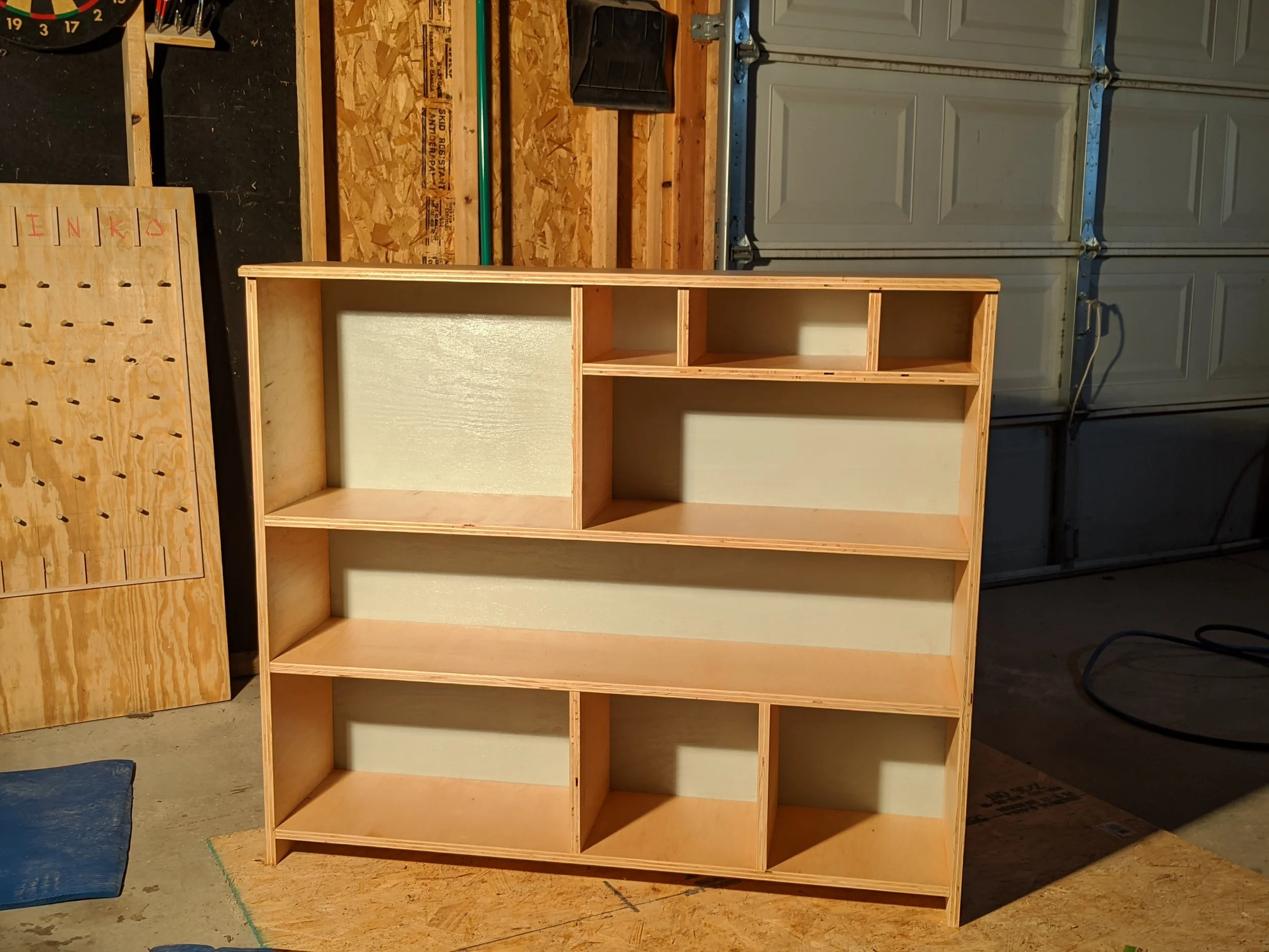A plywood bookshelf.