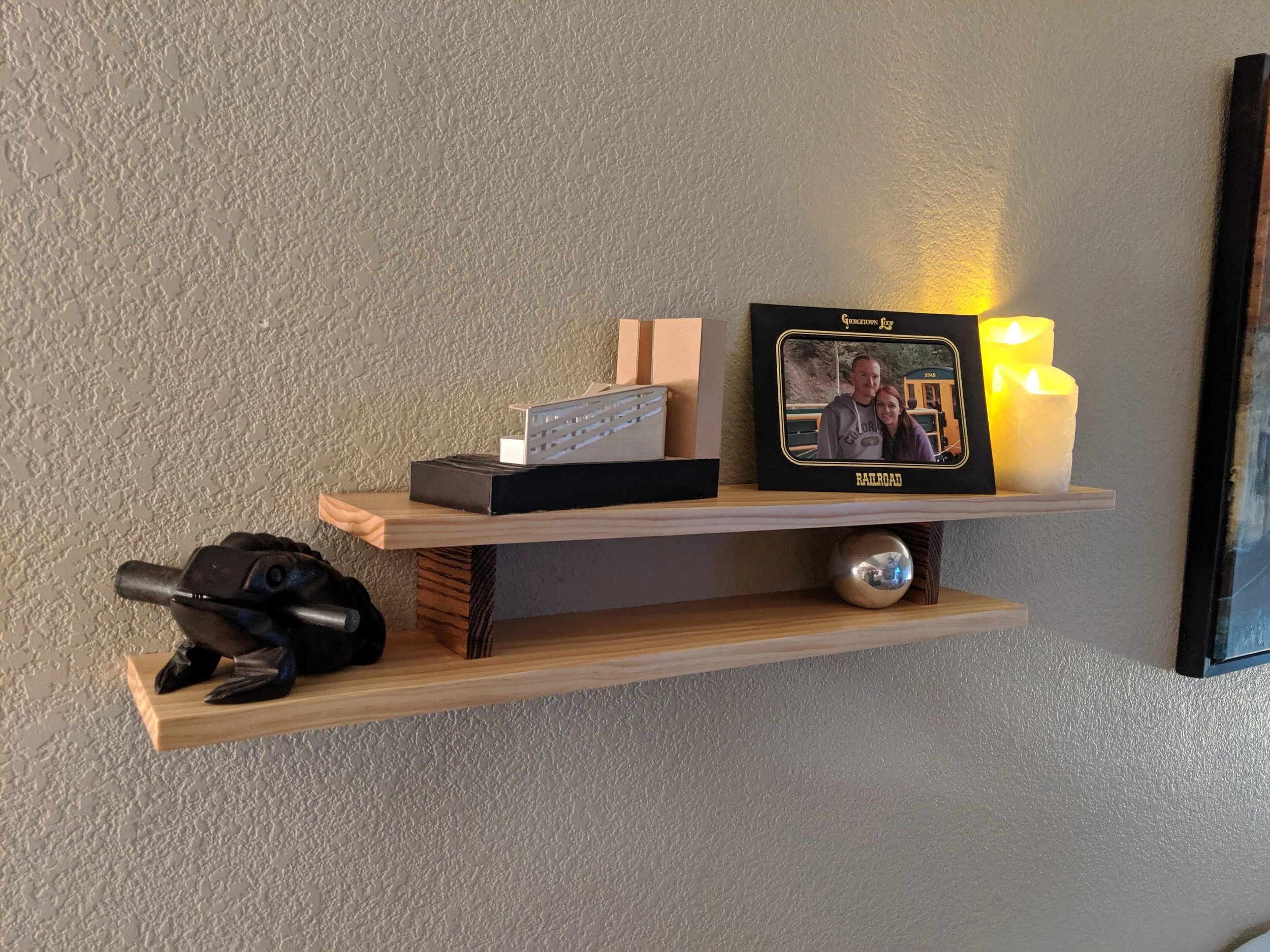 A simple shelf made from maple and red oak.