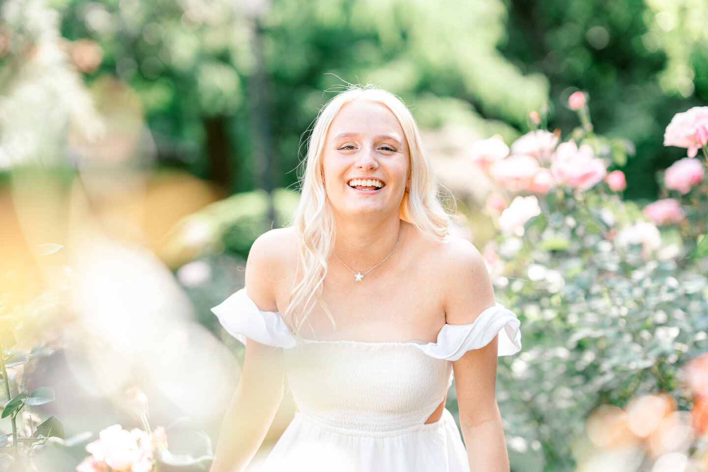 Happy Friday! The weather feels like fall, but it looks like spring! Enjoy this happy senior portrait from the Raleigh Rose Garden. 🌹