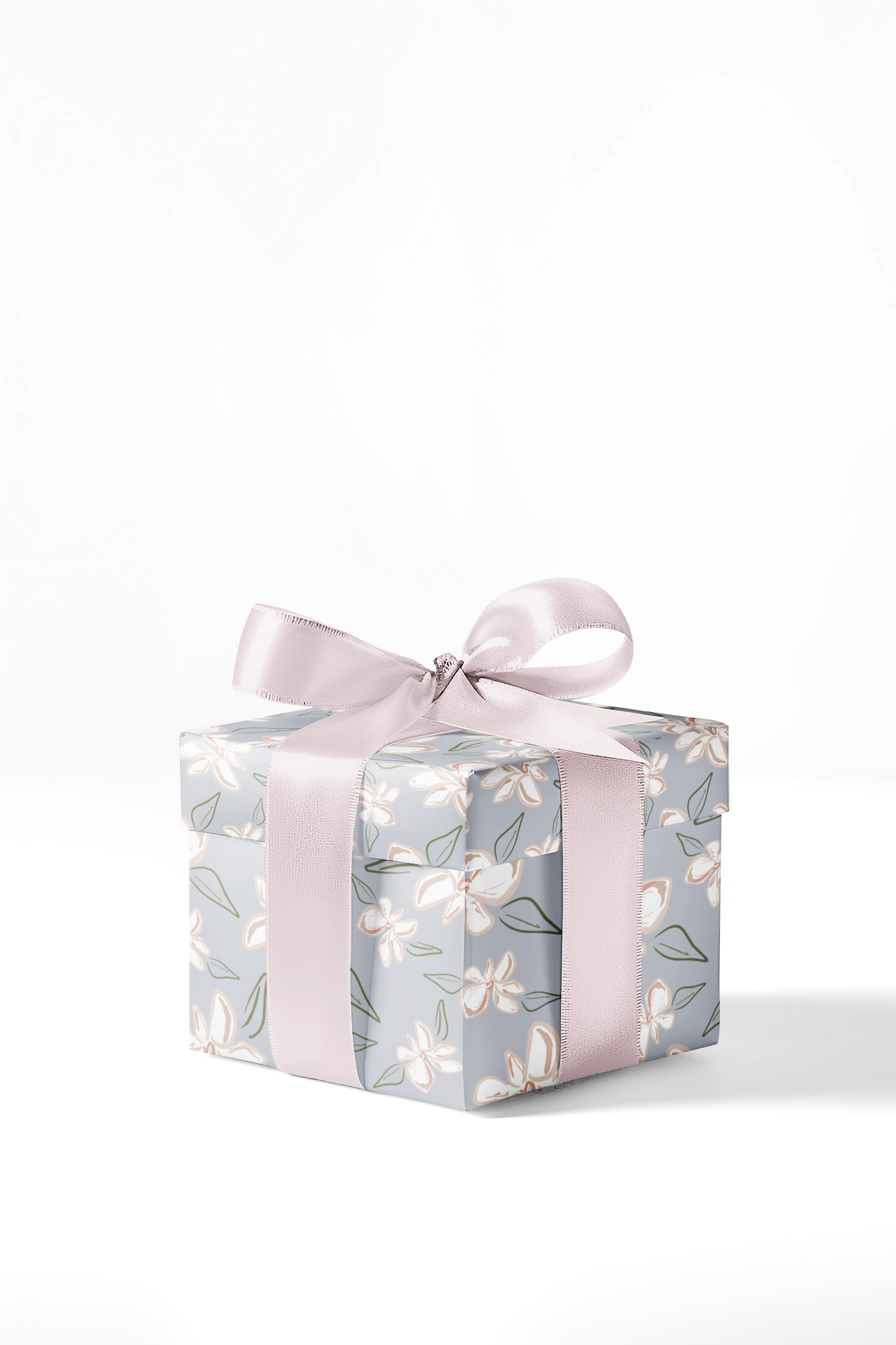 A premium gift wrapping sheet featuring painterly magnolias and sketched foliage on a cool light powder blue background. Perfect for any occasion.