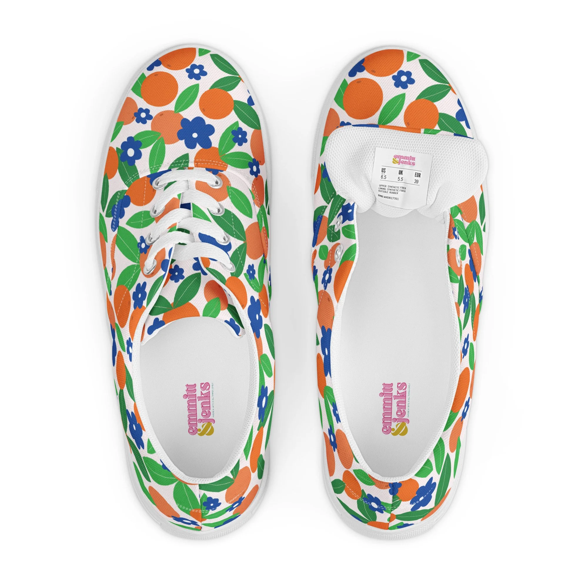 An instant closet staple. Perfectly match your aesthetic with these lace-up canvas sneakers, featuring a mod mix of bright citrus and bold blue blooms on a yogurt pink background.