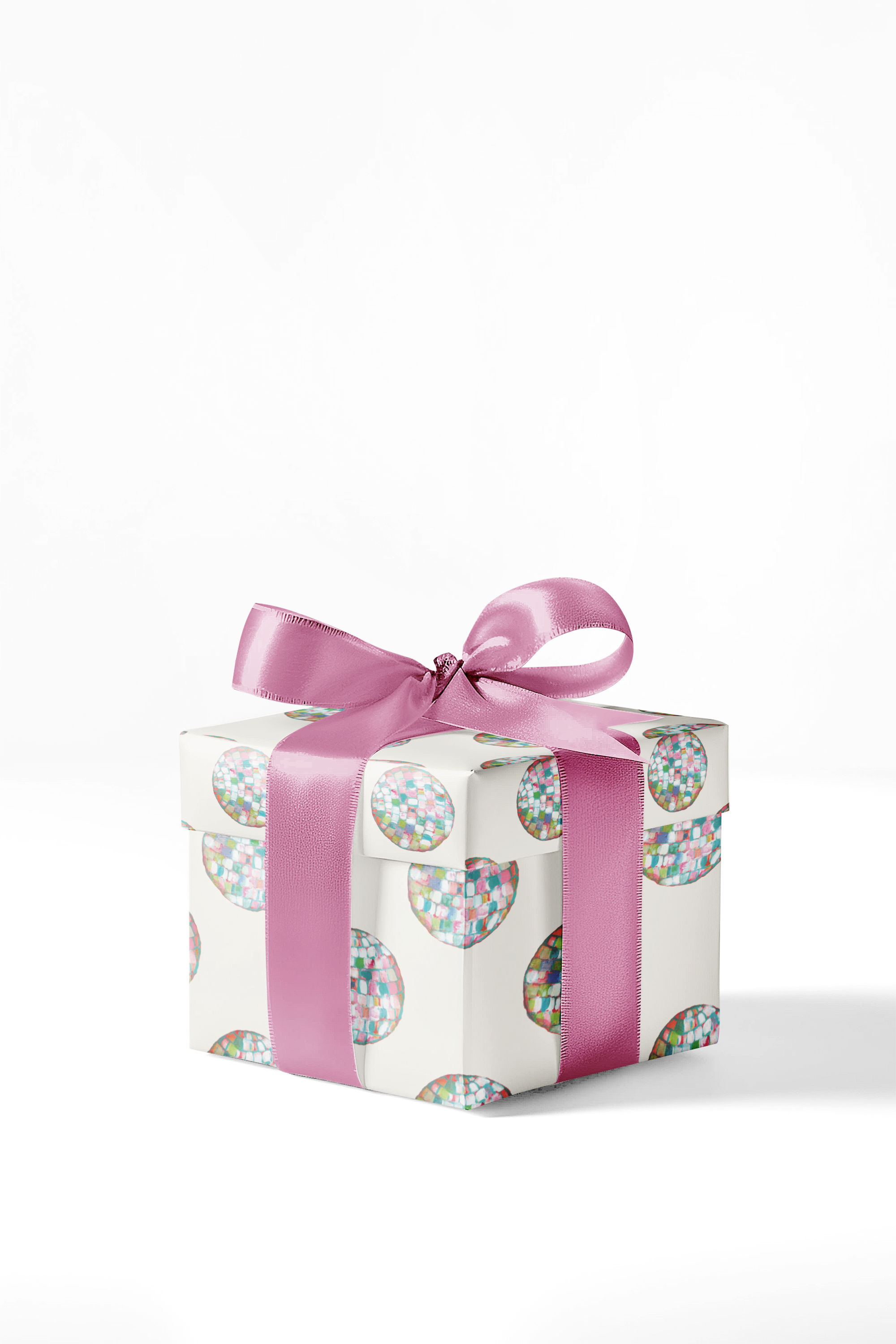 A premium wrapping paper sheet featuring a painterly pattern of disco balls in a fun and sweet color palette on top of a creamy beige. Great for any occasion!