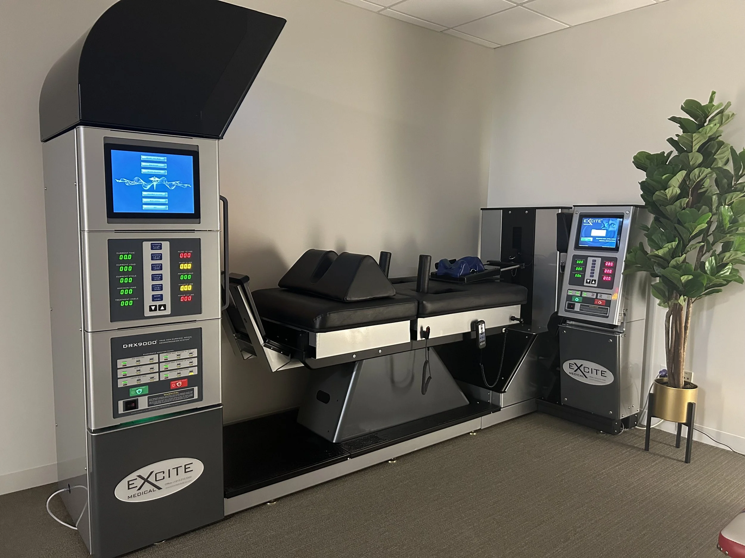 The DRX 9000 non-surgical spinal decompression machine in our Carmel Valley office