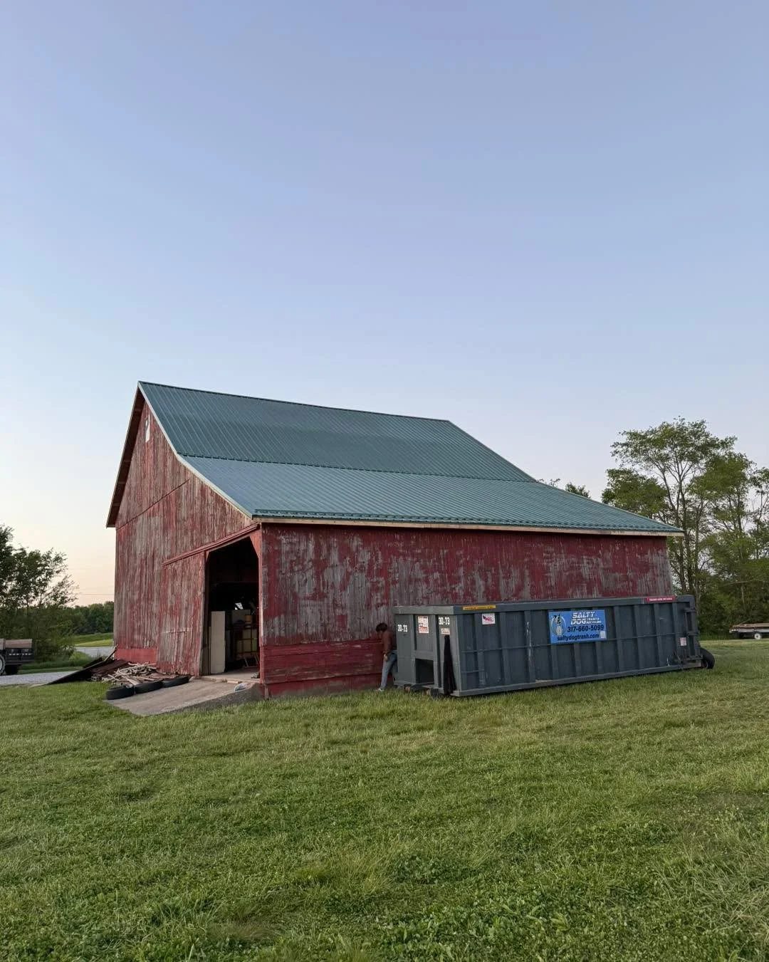 5 layer tear-off (metal, shingles, shingles, shingles, wood shakes) and decking. This old barn is ready for many many years to come!