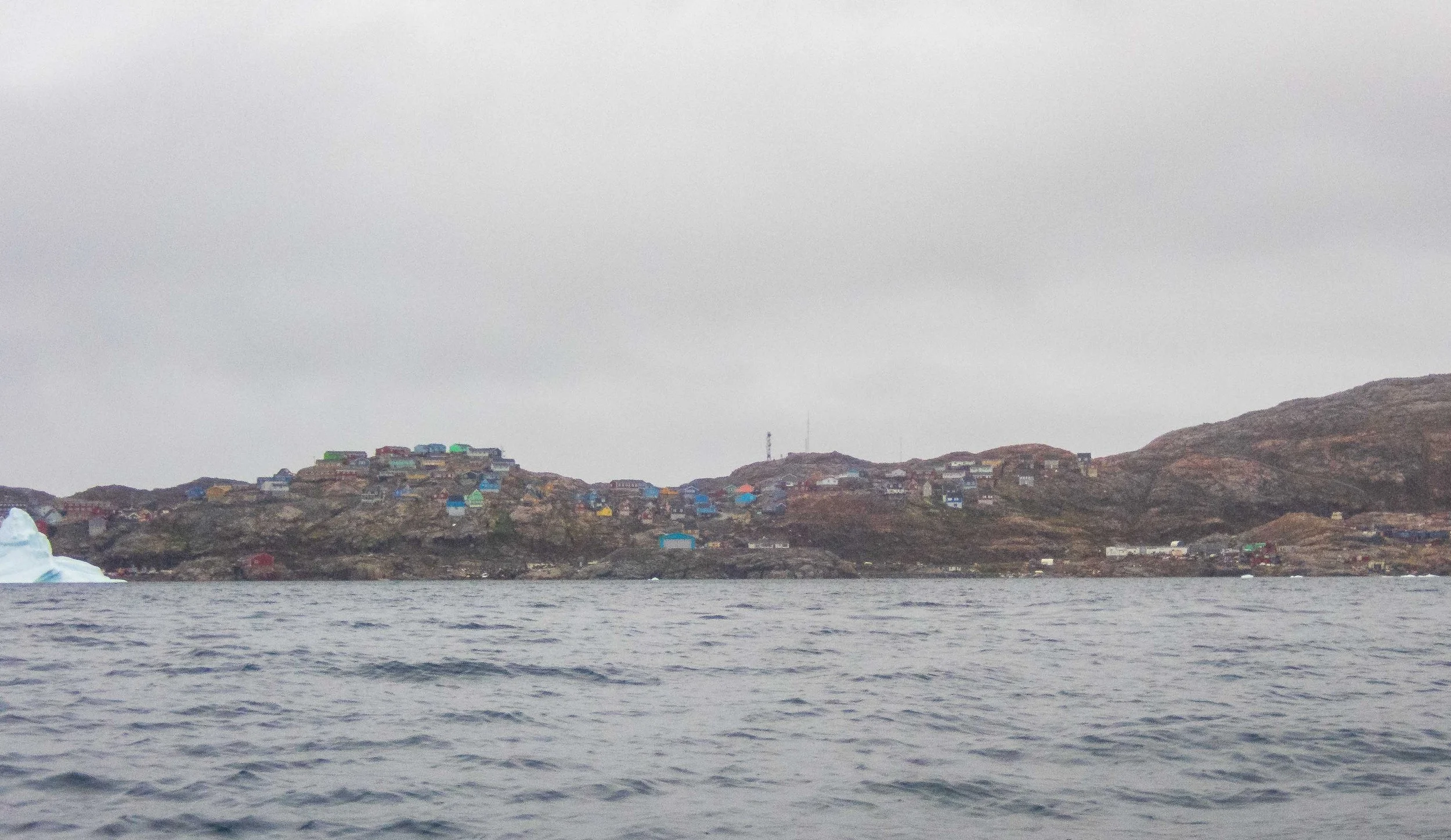 Paddling in to Uummannaq in the rain