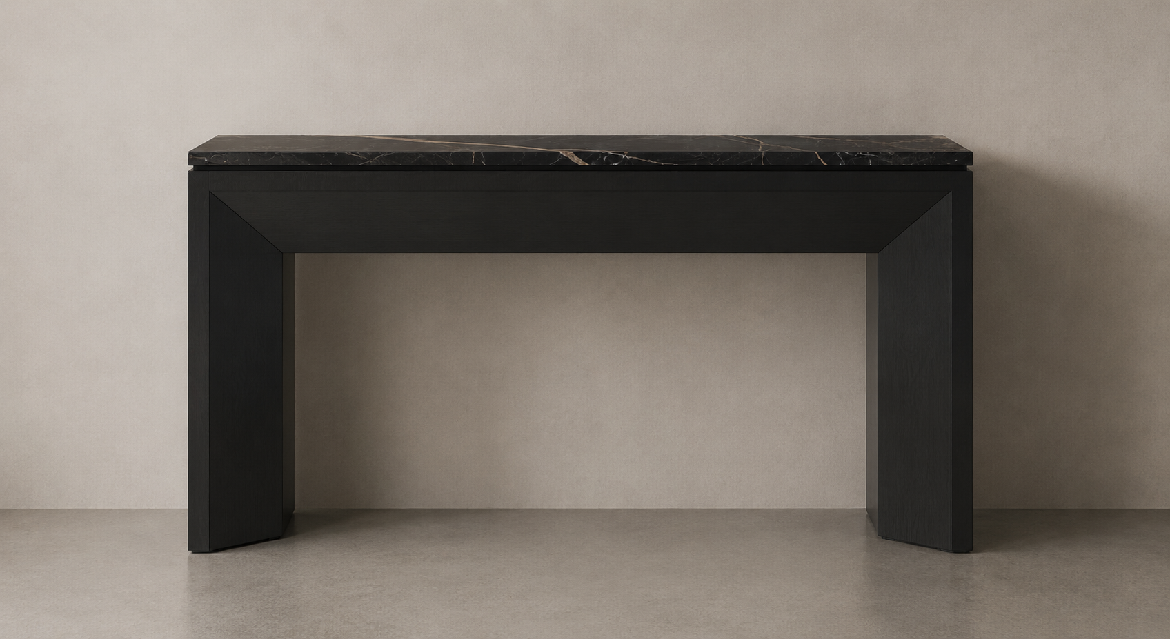 A black and marble fireplace mantel with a dark marble top against a beige wall.