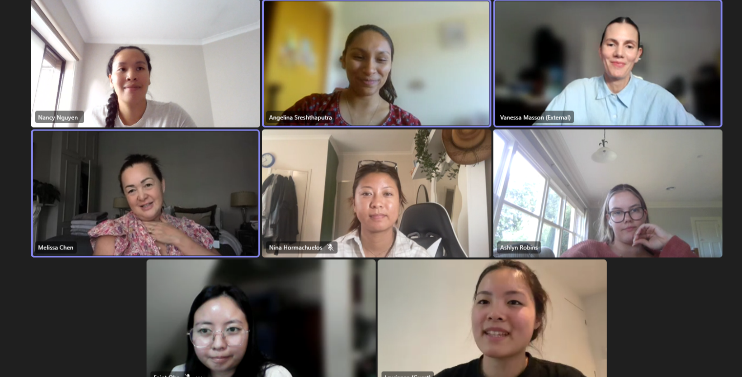 Group of eight women participating in a virtual video call, each in individual home settings with various backgrounds.