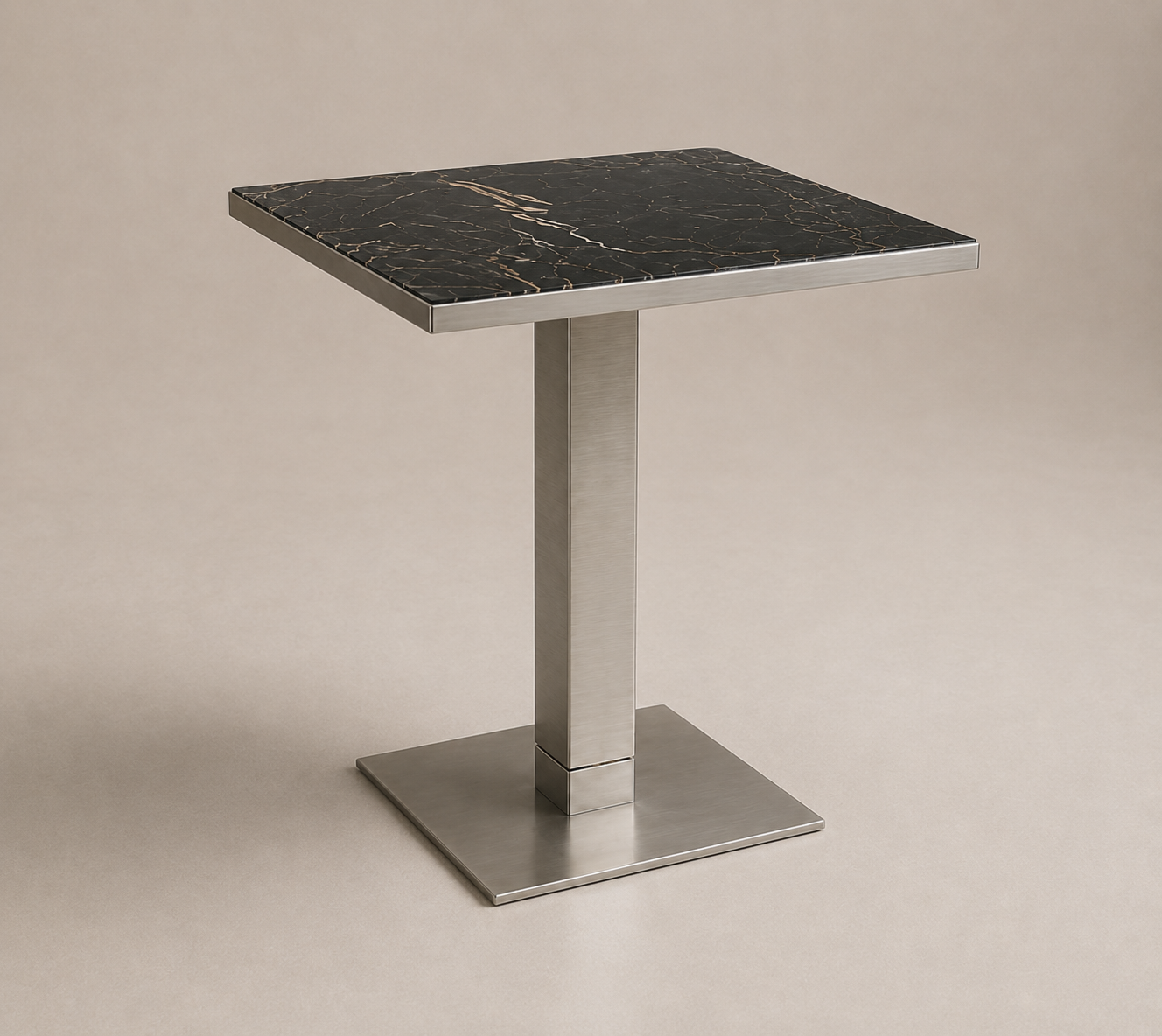 A modern square side table with a black marble top and a brushed metal pedestal base.
