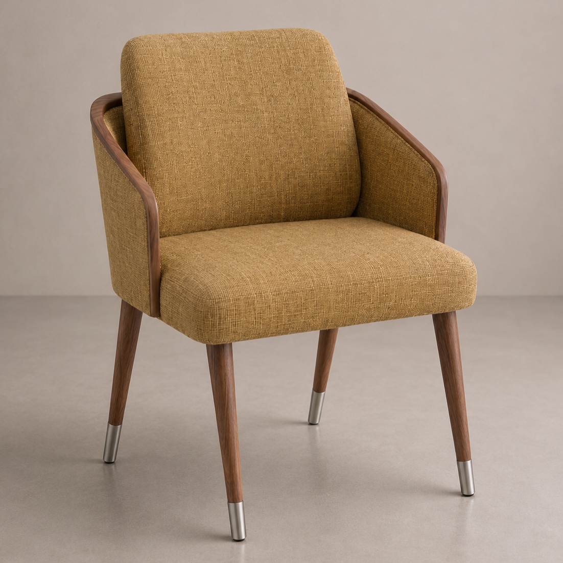 A vintage-style armchair with a mustard-yellow fabric upholstery, wooden armrests, and tapered wooden legs with metal caps at the bottom, set against a neutral background.