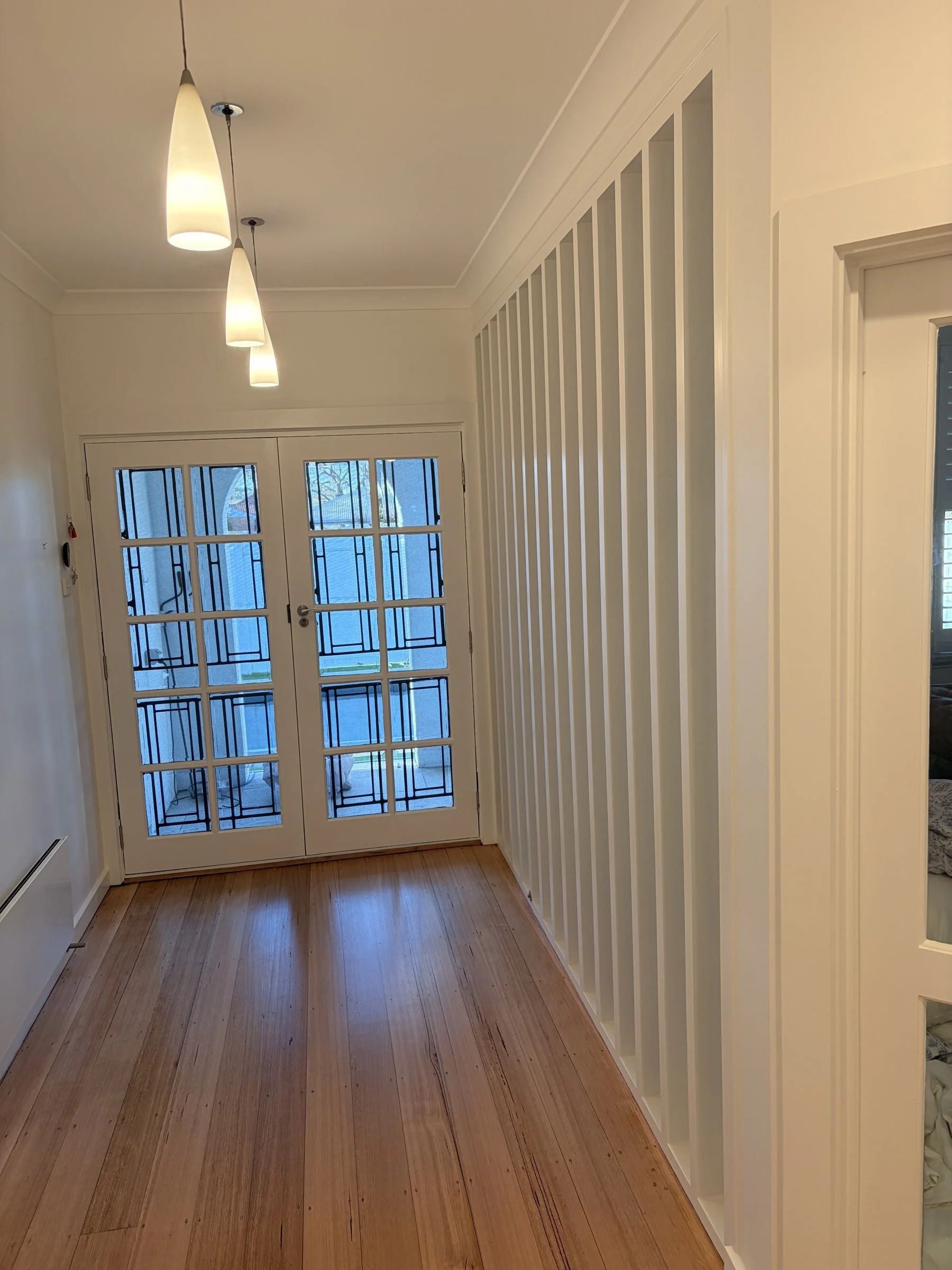 06-renovation-hallway-french-doors.jpg