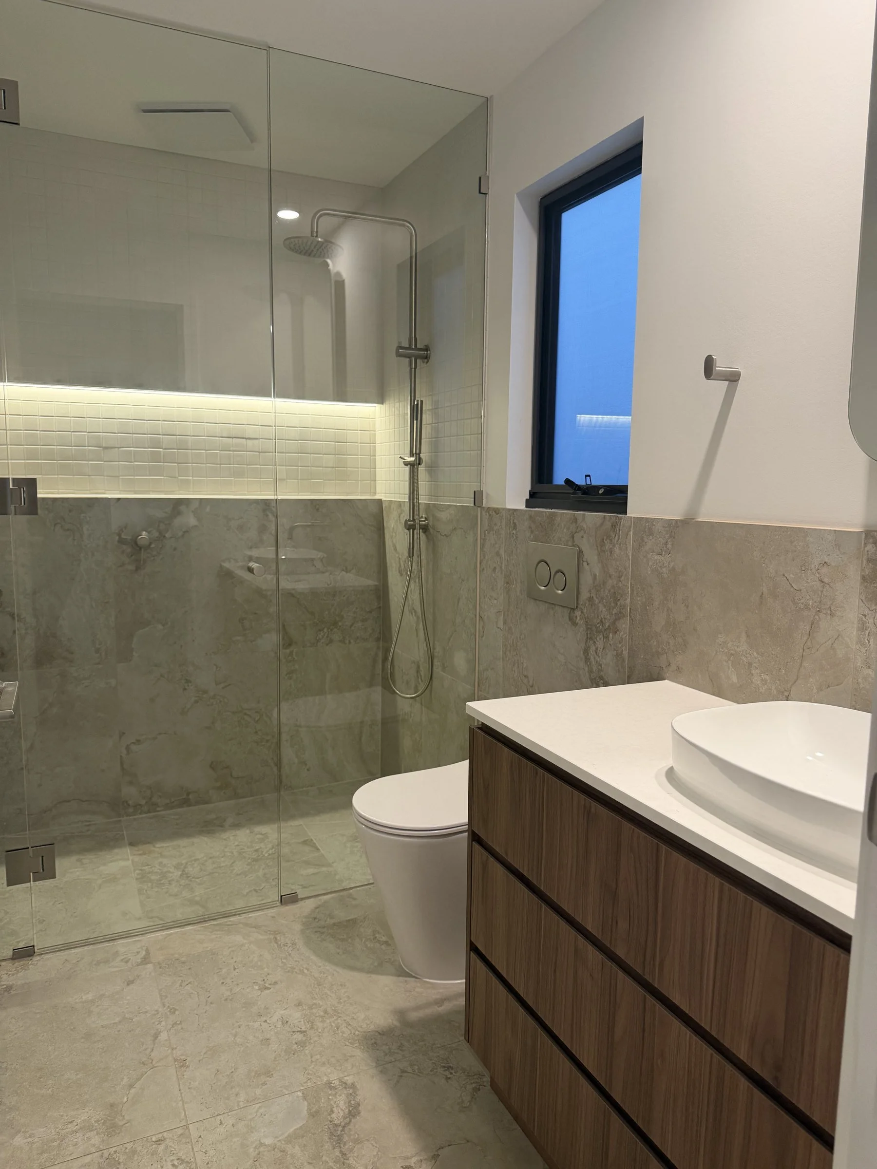 11-bathroom-renovation-vanity-shower-niche.jpg