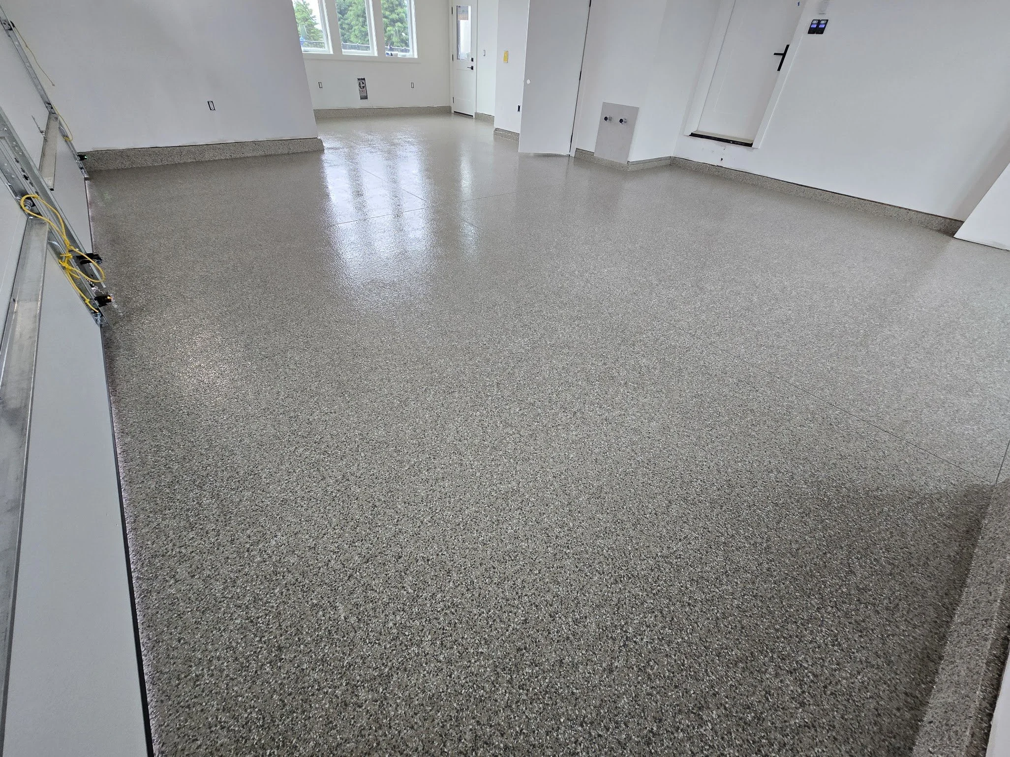 Picture of a concrete floor with speckled finish