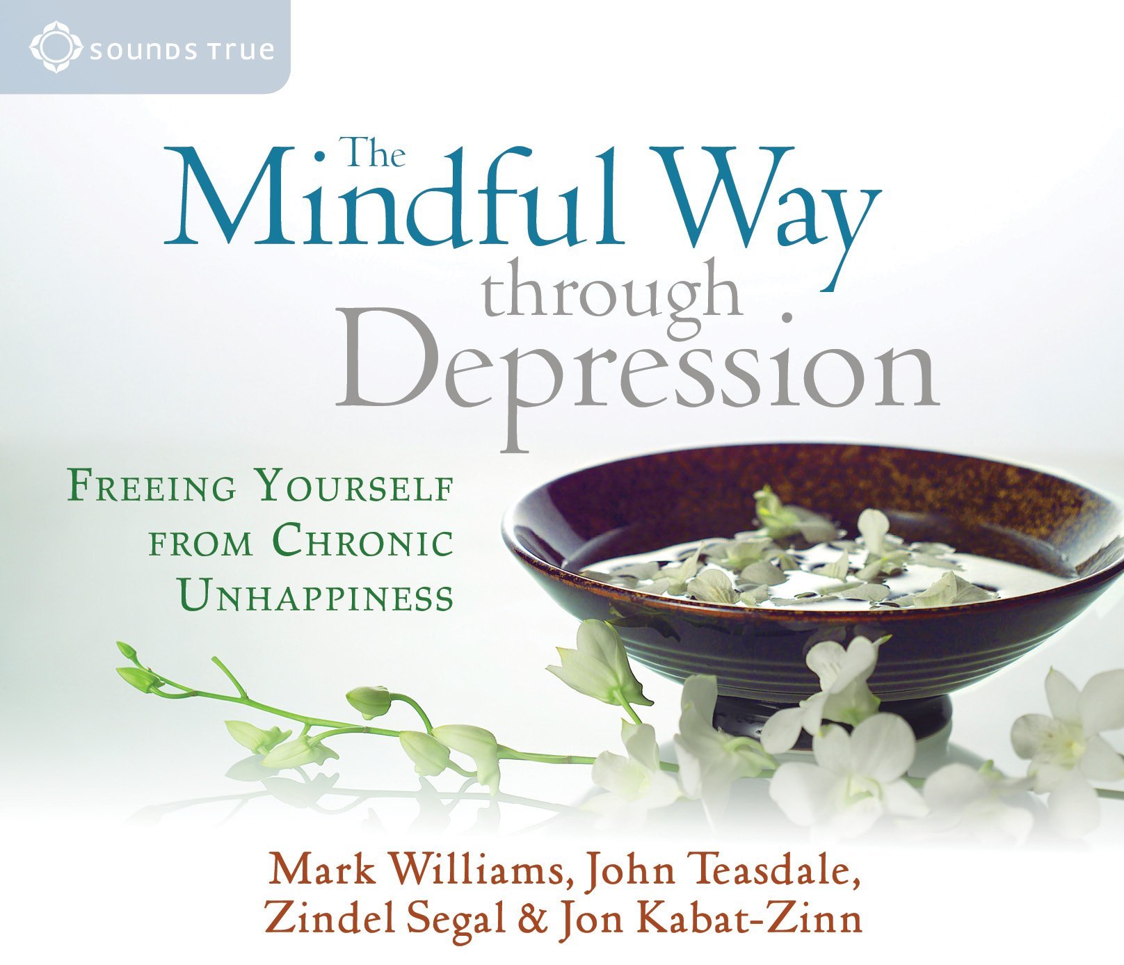 Book cover titled "The Mindful Way through Depression: Freeing Yourself from Chronic Unhappiness" by Mark Williams, John Teasdle, Zindel Segal, and Jon Kabat-Zinn, featuring a bowl of tea with floating flower petals and white flowers in the foreground.
