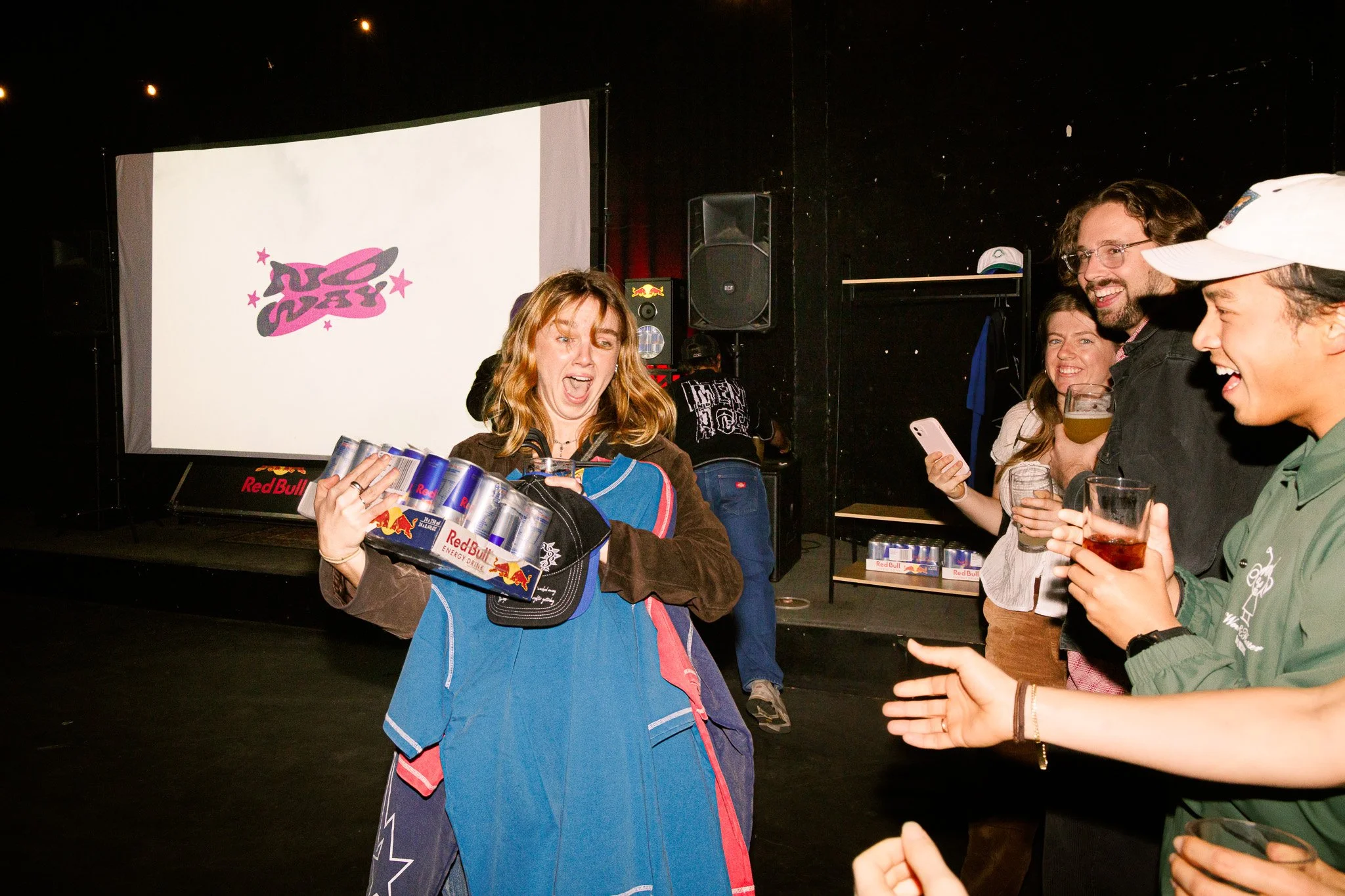 Redbull Events, energy drinks, people smiling and having a good time. Redbull giveaways.