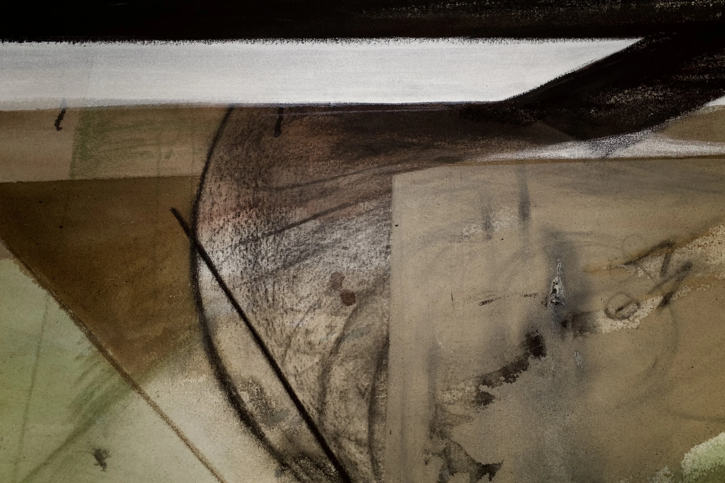 A close-up of a textured surface with dark, black lines and smudges on a light background, possibly an abstract or artistic drawing or painting.