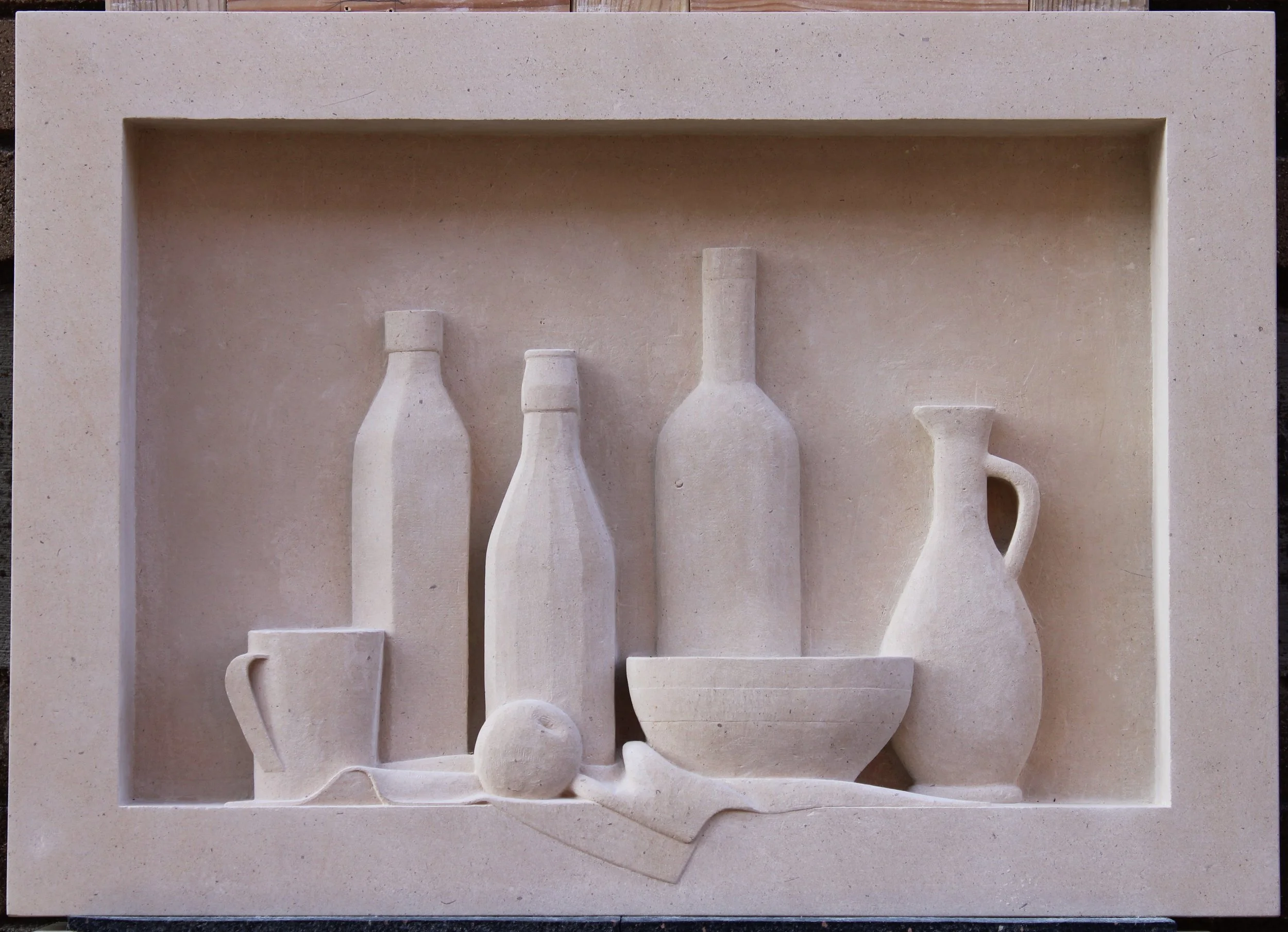 Still life, 2025, Lavoux limestone, 70 x 50 x 8 cm.