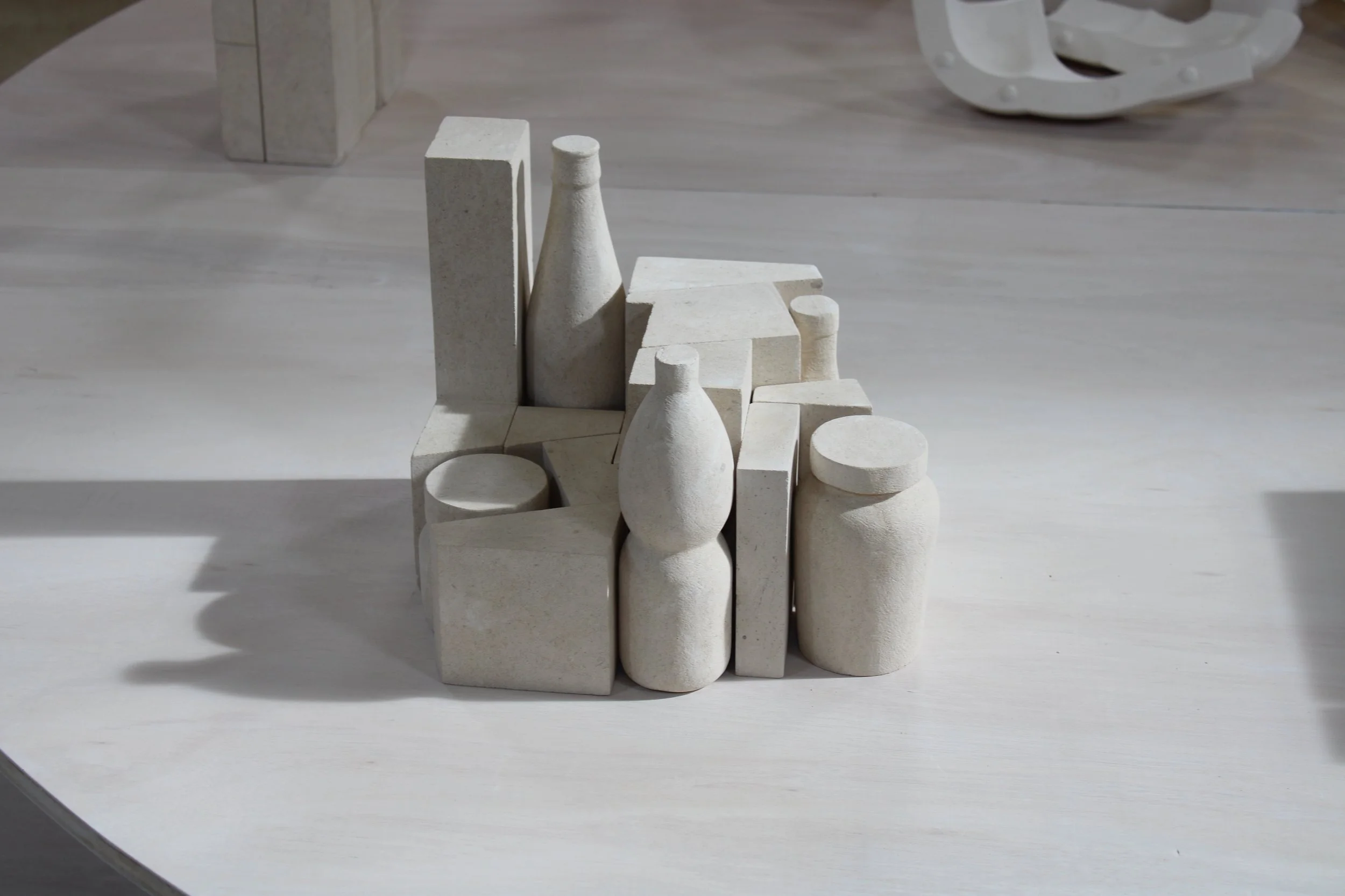Still life, 2025, 19 Lavoux limestone pieces, 32 x 24,5 x 25,7 cm.