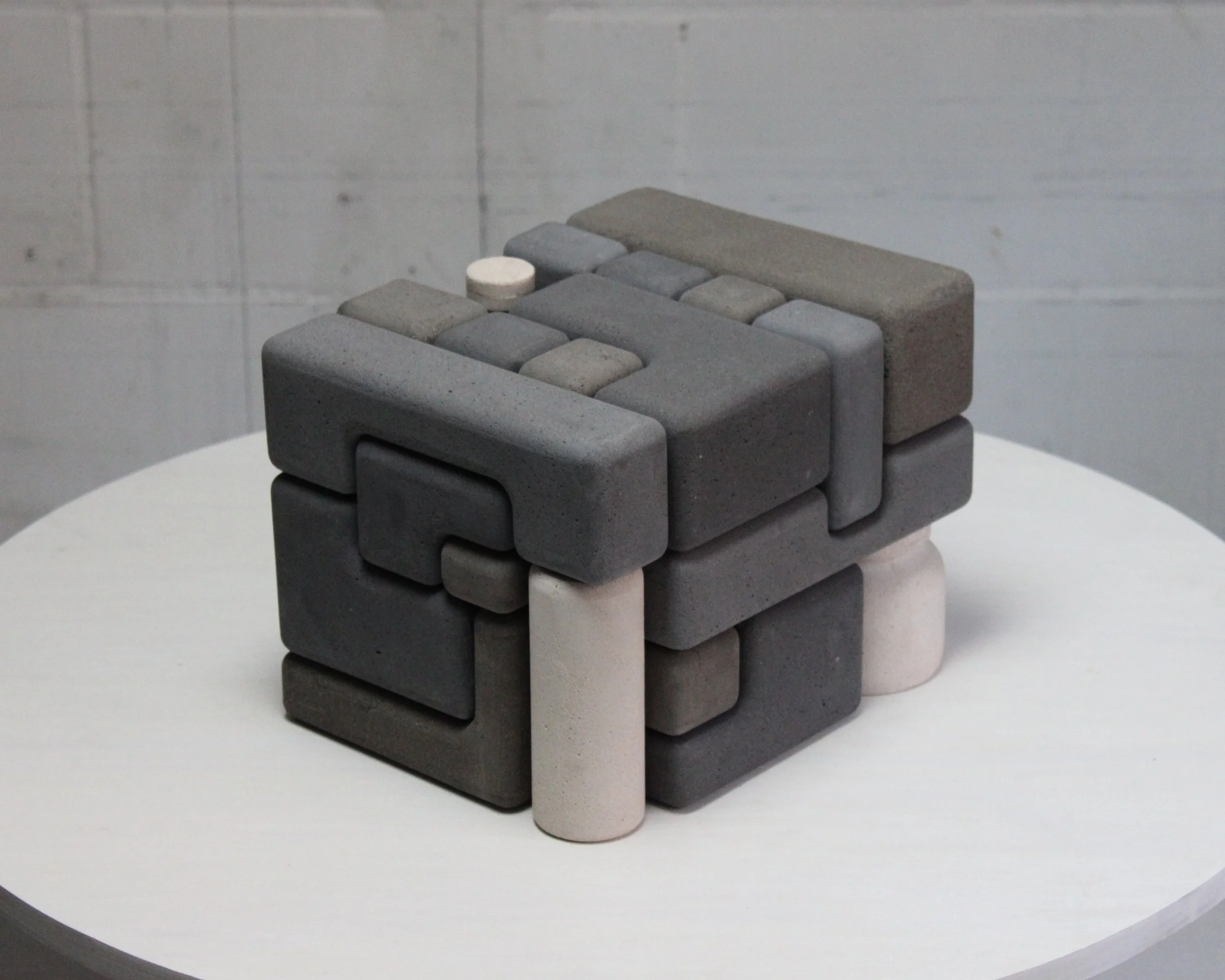 Fasten, 2025, 20 jesmonite pieces, 22 x 20,3 x 28 cm.