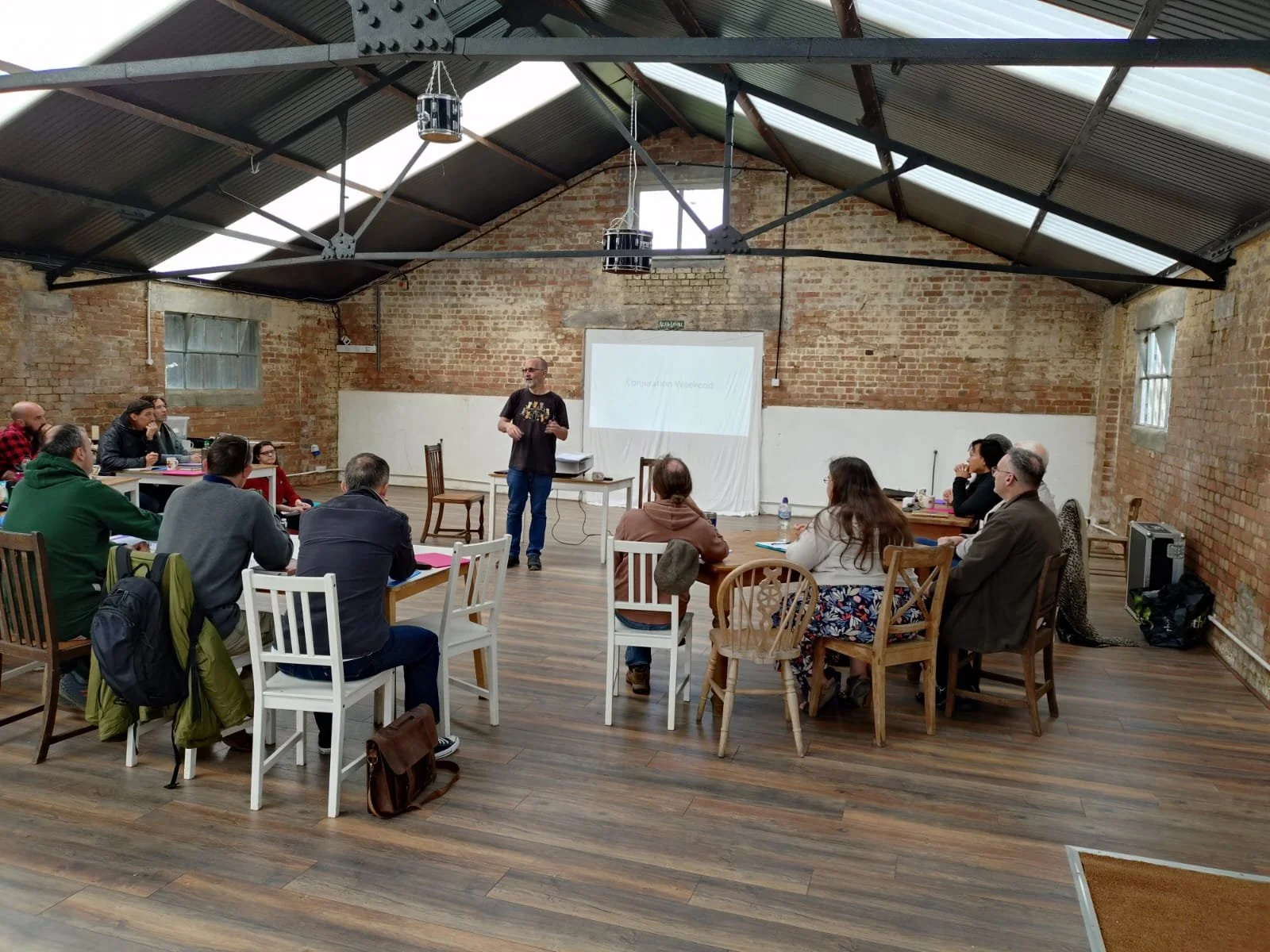 david lecturing standing.jpeg