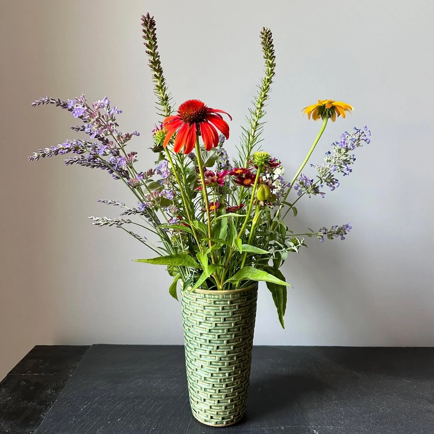 Lovely new vase filled with flowers from our roof garden! I threw this on the wheel, hand carved it with a brick motif, then glazed it in a luscious green. It&rsquo;s available at barryriceceramics.com.

#ceramics #wheelthrown #powerhouse_arts #handm