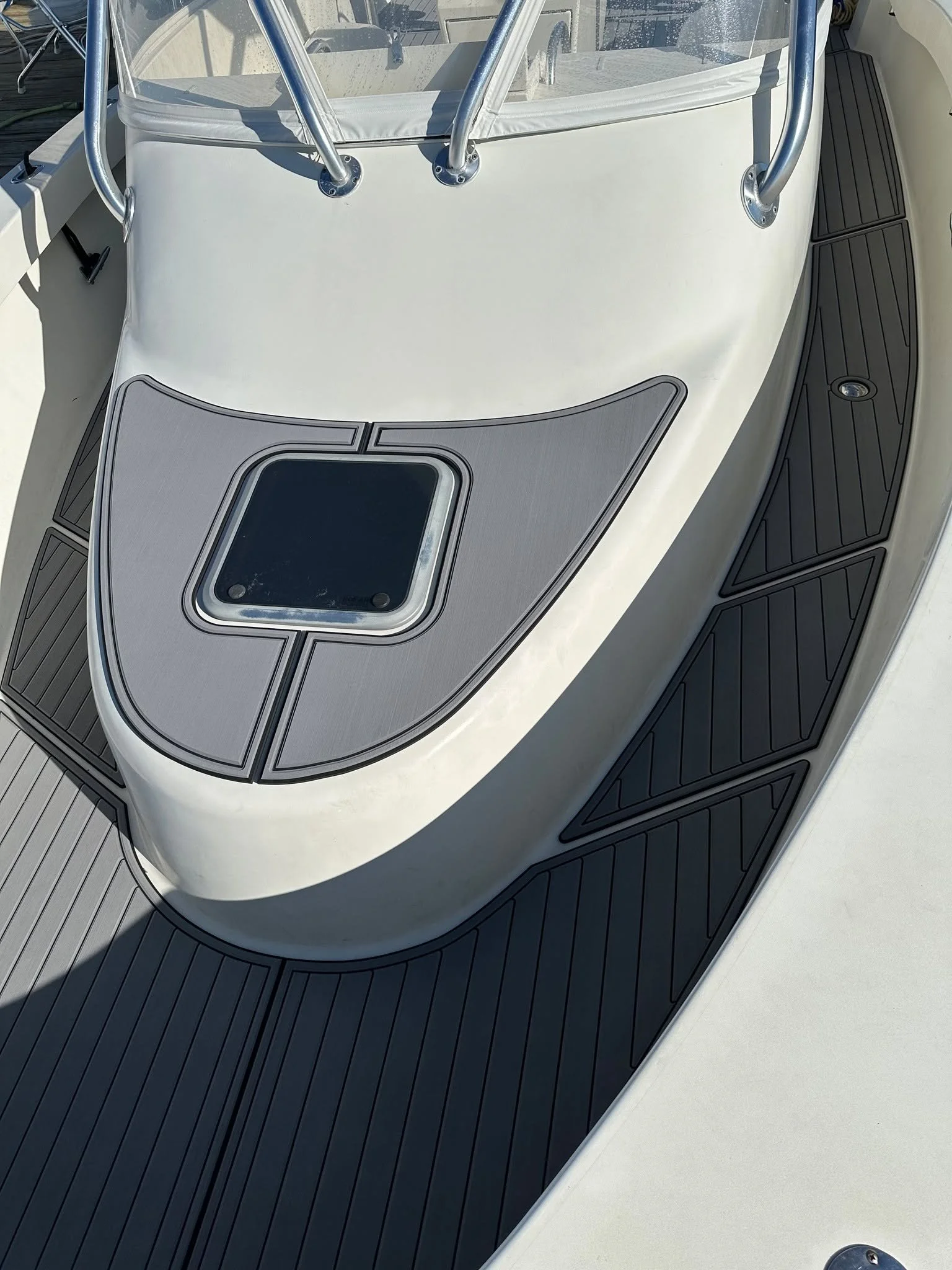 Just when you thought it was safe to go back in the water... 🐟 BAD DOG, the 33' L&amp;H Walkaround, gets a fresh new MarineMat 9mm deck at MacMillan Pier in Provincetown! 🎉 This pup's ready for private whale watching charters with Sea Salt Charters